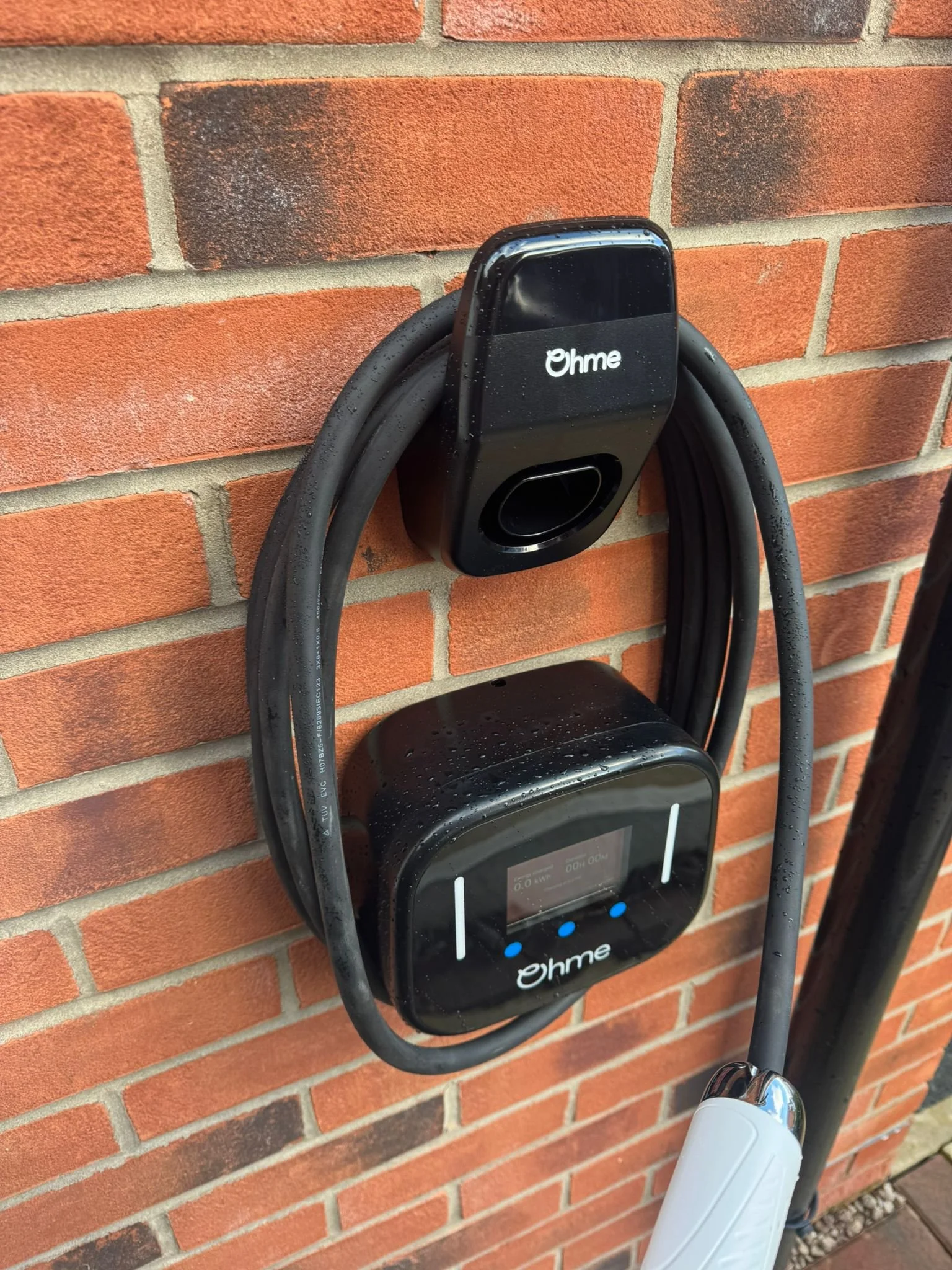 ohme-electric-car-charger-fitter.jpg