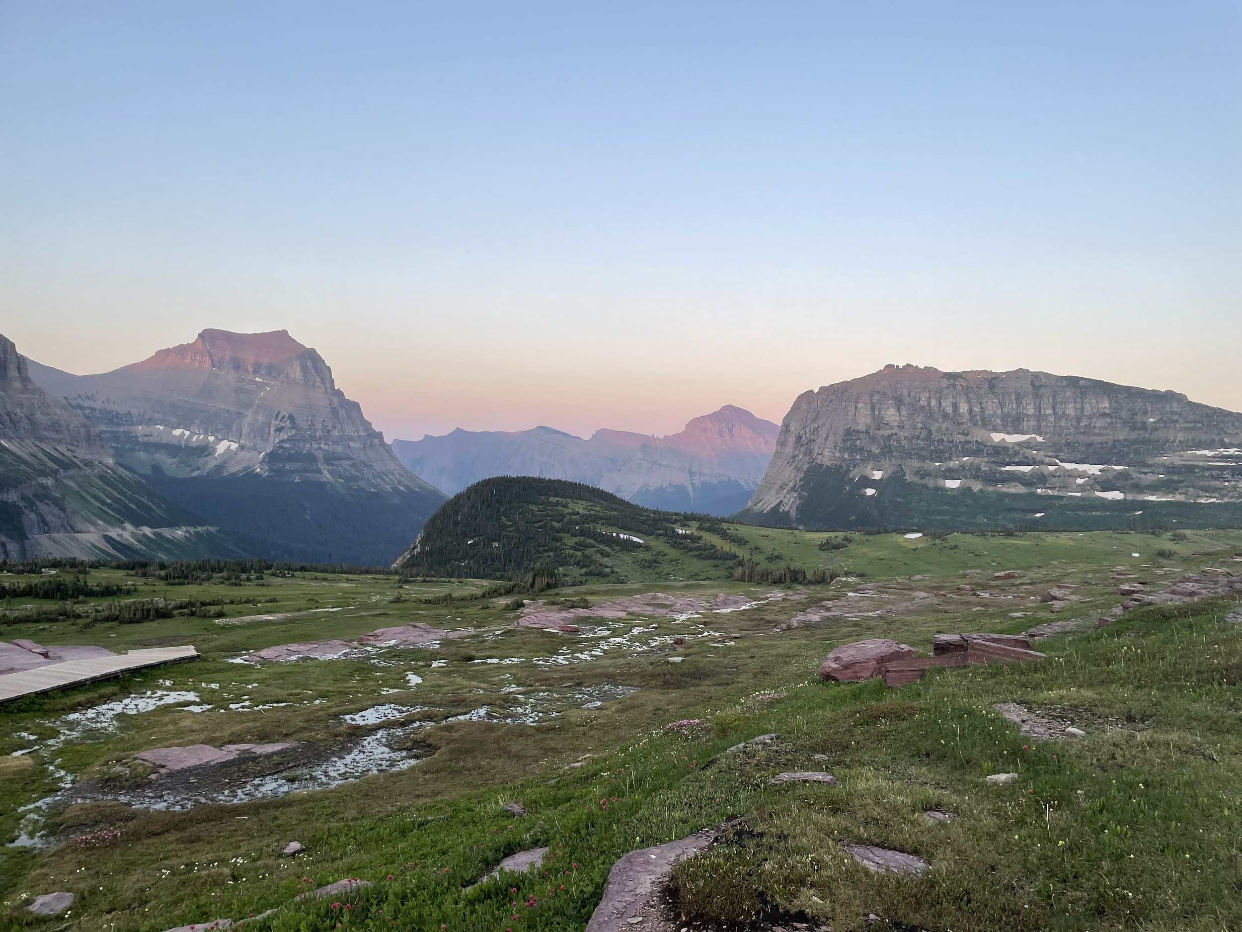 Calm mountain landscape at sunrise, symbolizing the clarity and self-trust that comes with emotional healing