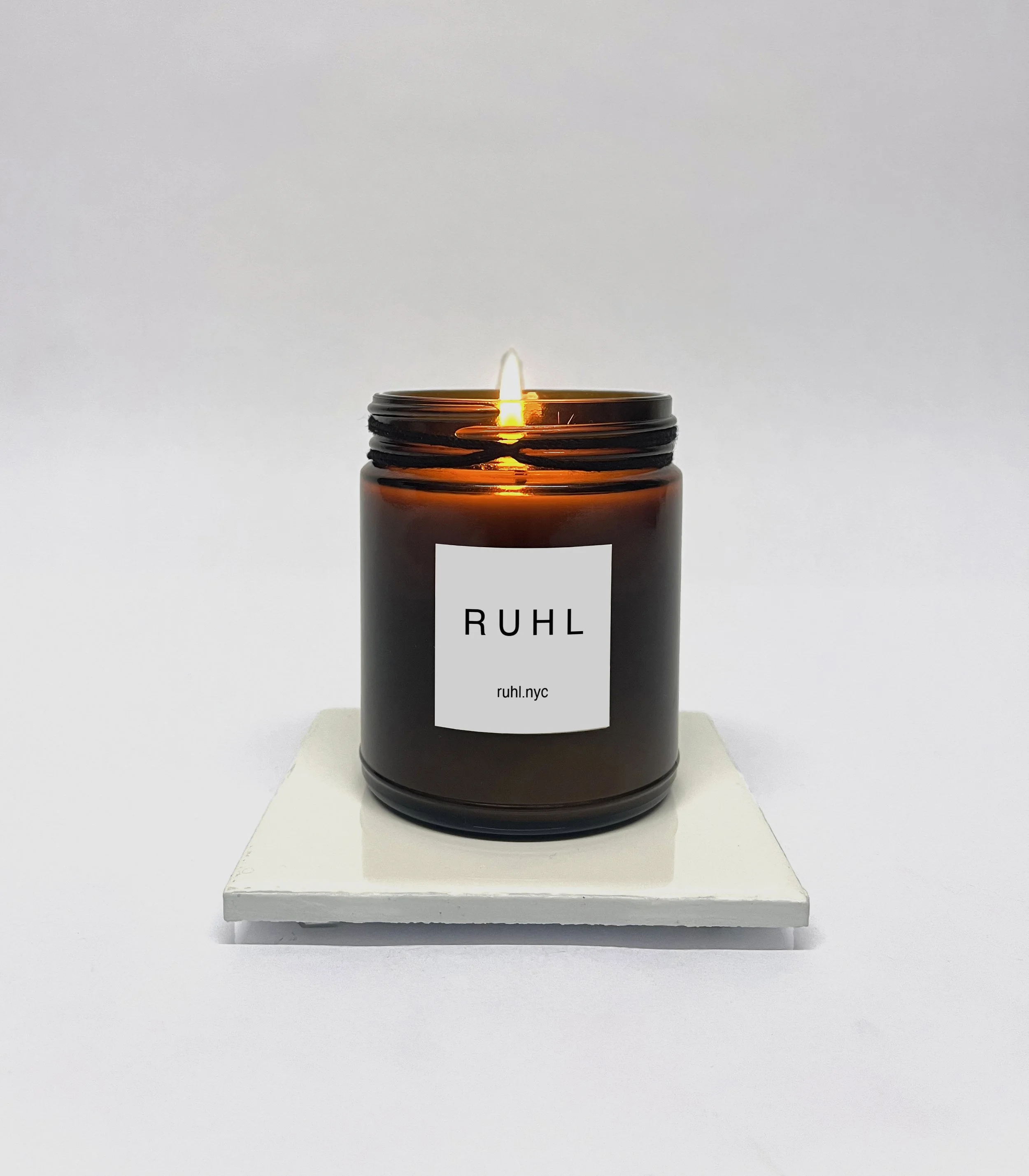 R U H L Candle on tile v1.jpg
