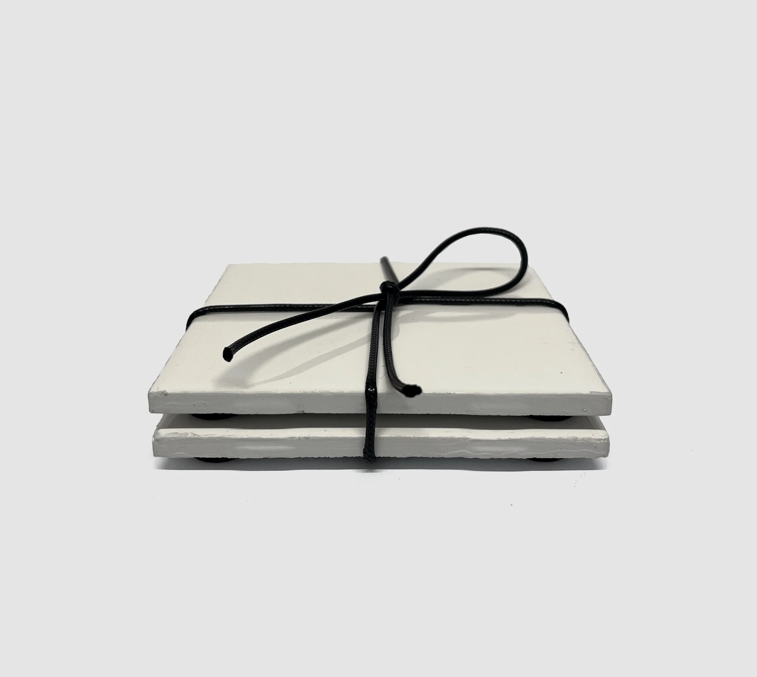 Trivet Pair black tie Off-White v1.jpg