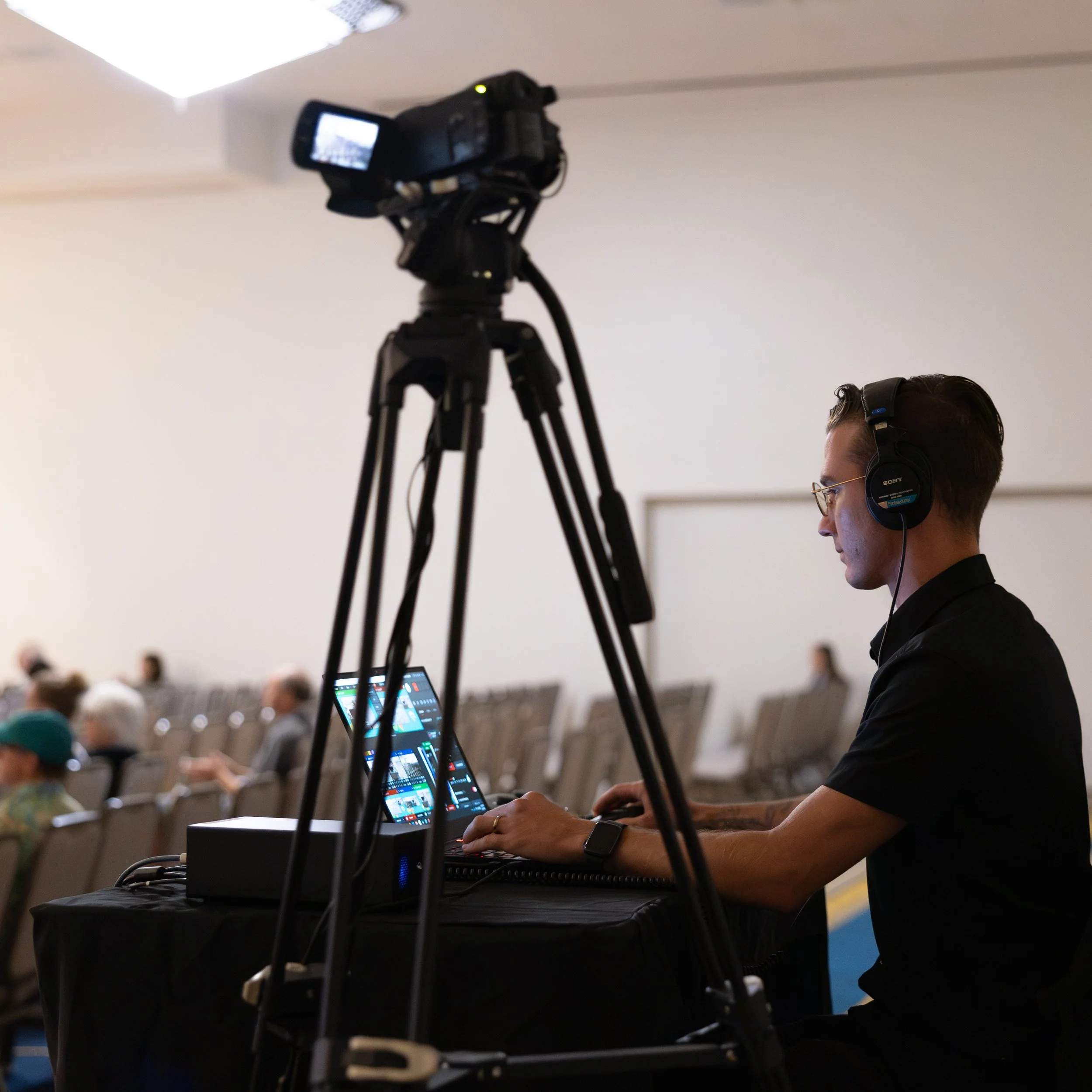 Professional event livestreaming and video production in Hawaii with camera operator and live production equipment