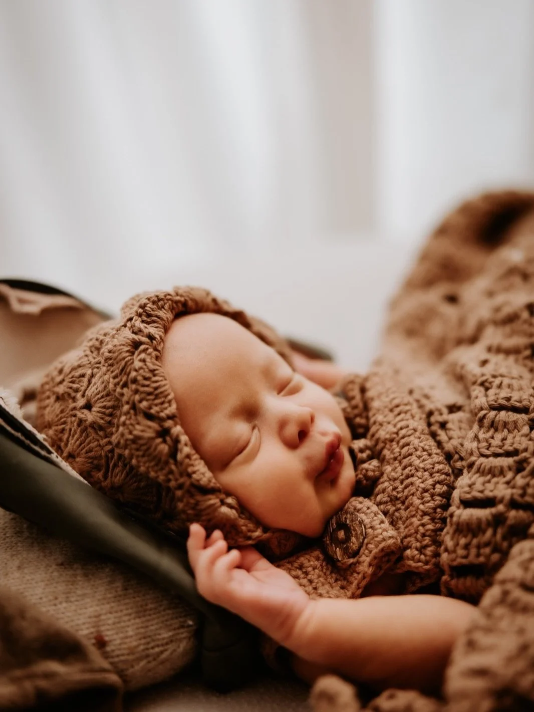 They won&rsquo;t always be this small

Those hands that curl around your finger without even trying

Those feet that have never touched the ground

And that hat? His grandad&rsquo;s..

Because this little one carries his name too.

Some details in a 