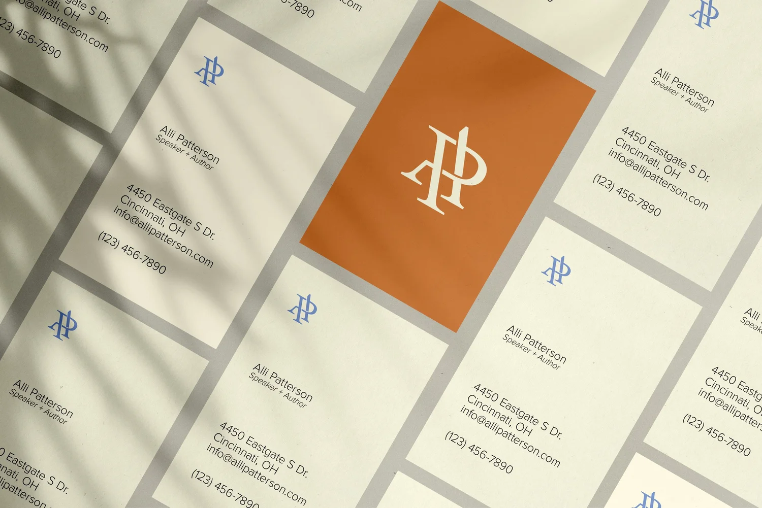 Alli Patterson business cards in cornsilk and caramel with the AP monogram