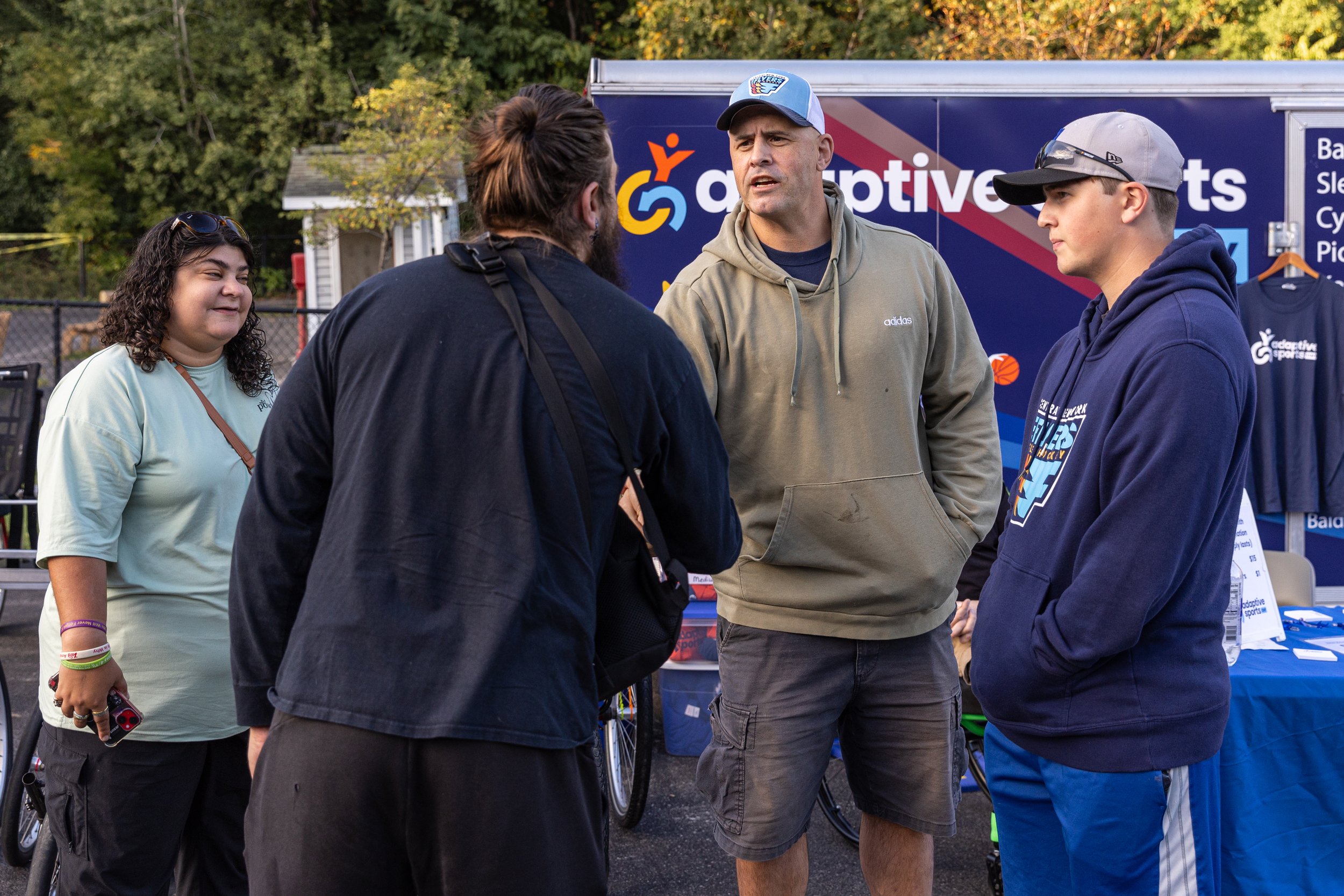 On behalf of CNY Adaptive Sports, Jamie explains adaptive bikes and scooters to families at The Jowonio School, a nonprofit preschool serving young children with various abilities.
As the treasurer of CNY Adaptive Sports, the organization behind the