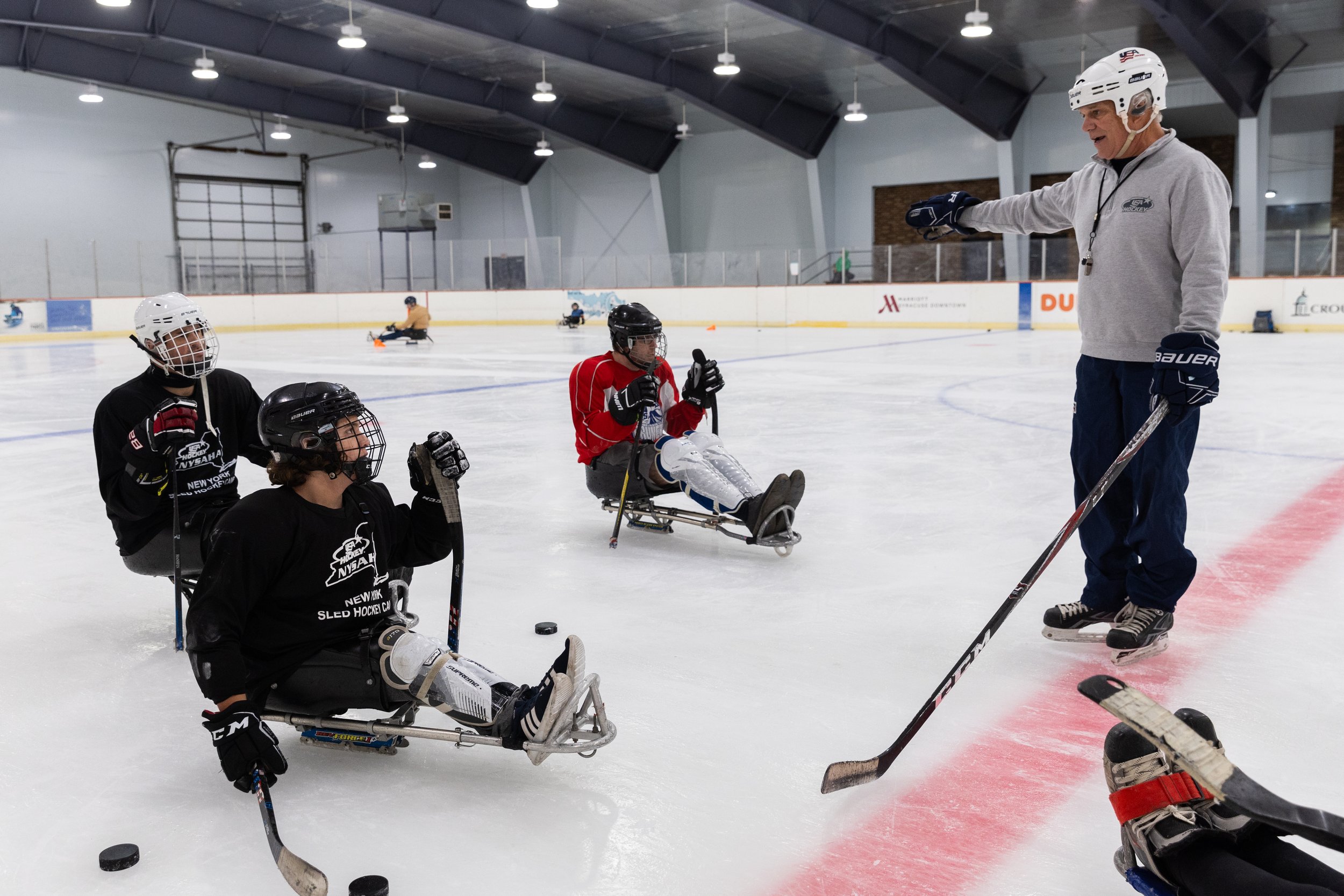 The Central New York Flyers practice at Sunny Crest Ice Rink with their head coach, Chuck Gridley.
Weekly practices didn’t just spark Myles’ love for the sport; they also sparked Jamie’s. Over time, Jamie found himself becoming an integral part of t