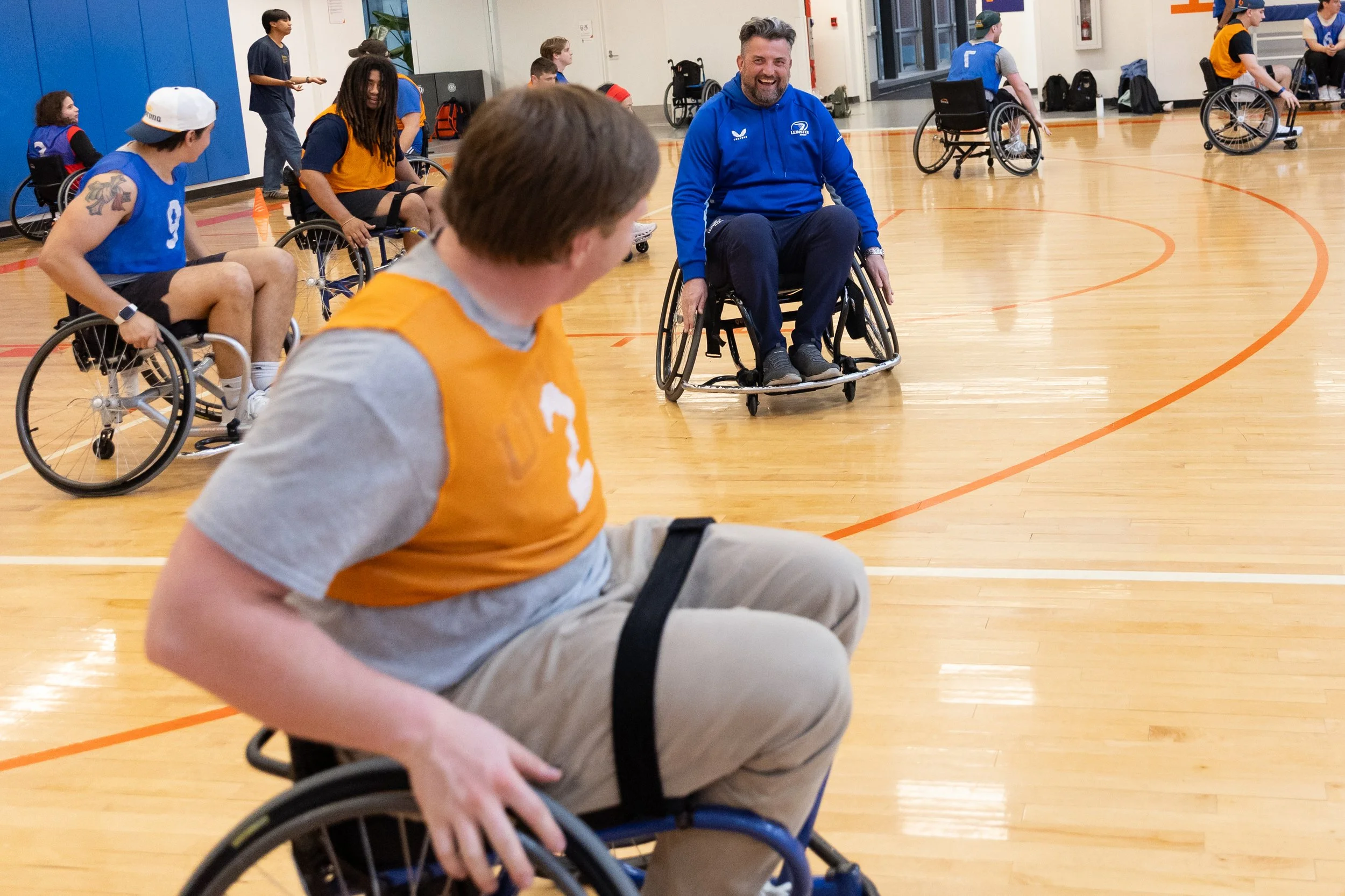 Head Coach Colin O’Hare chases Patrick down during their partnership with CNY Adaptive to play wheelchair rugby on Apr. 4, 2026. Through their partnership with Leinster, the Syracuse Rugby team now implements a European-style development model focuse