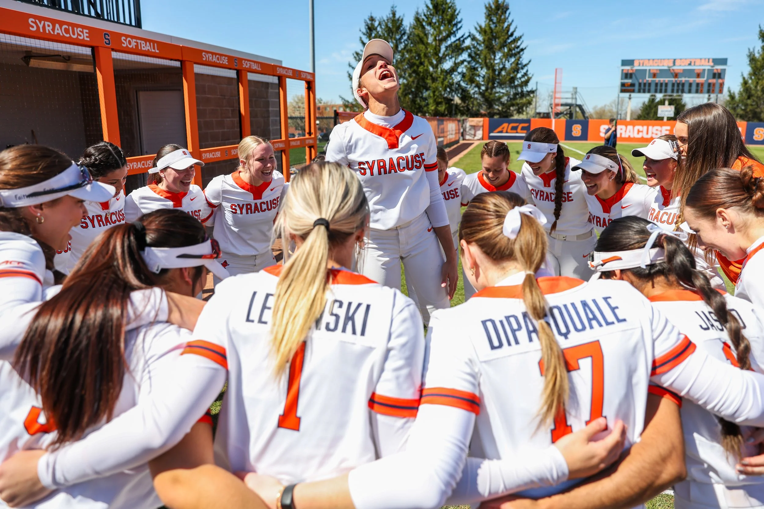 Syracuse softball’s Rebecca Clyde leads her teammates in a pregame chant on April 26, 2024, in Syracuse, N.Y.