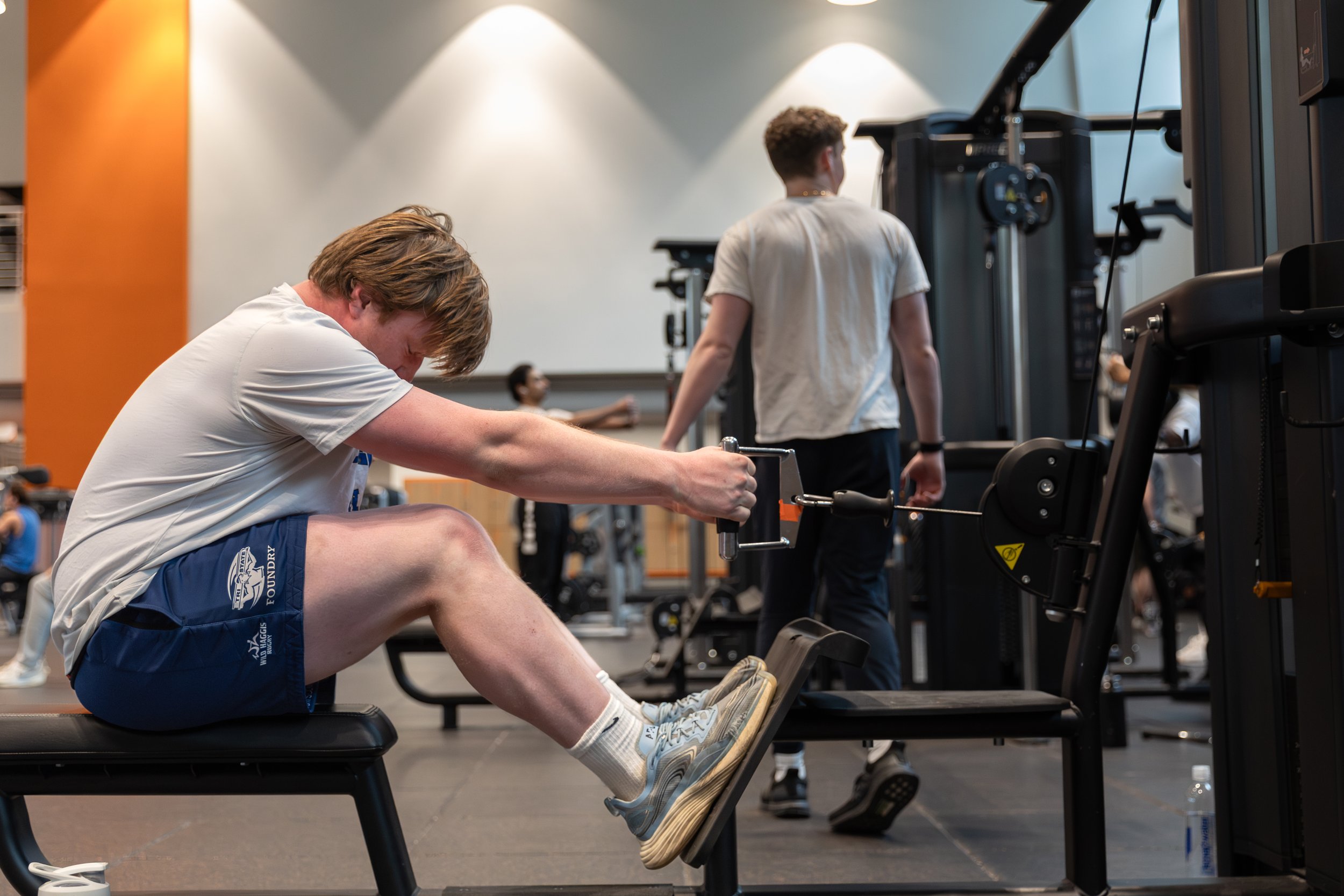 During an early-morning lift at the Barnes Center, Patrick reflects on all the demands it has taken to get to this point. Behind the scenes, this journey has been the result of countless hours of training, community service, and academic dedication, 