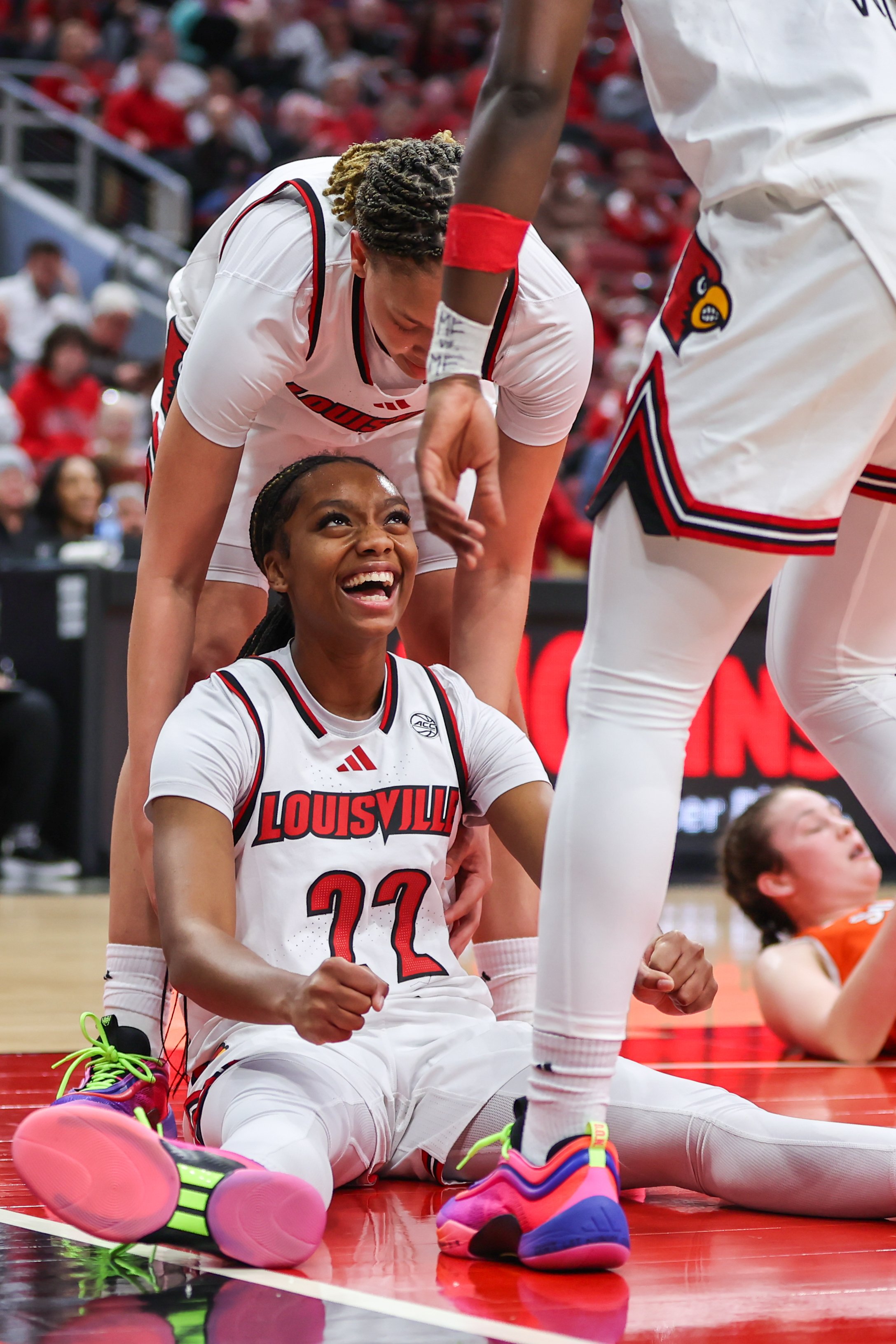 Louisville women’s basketball’s Tajianna Roberts (22) celebrates under the basket after Syracuse’s Sophie Burrows committed an offensive foul during the second quarter on Jan. 16, 2025, in Louisville, Ky.