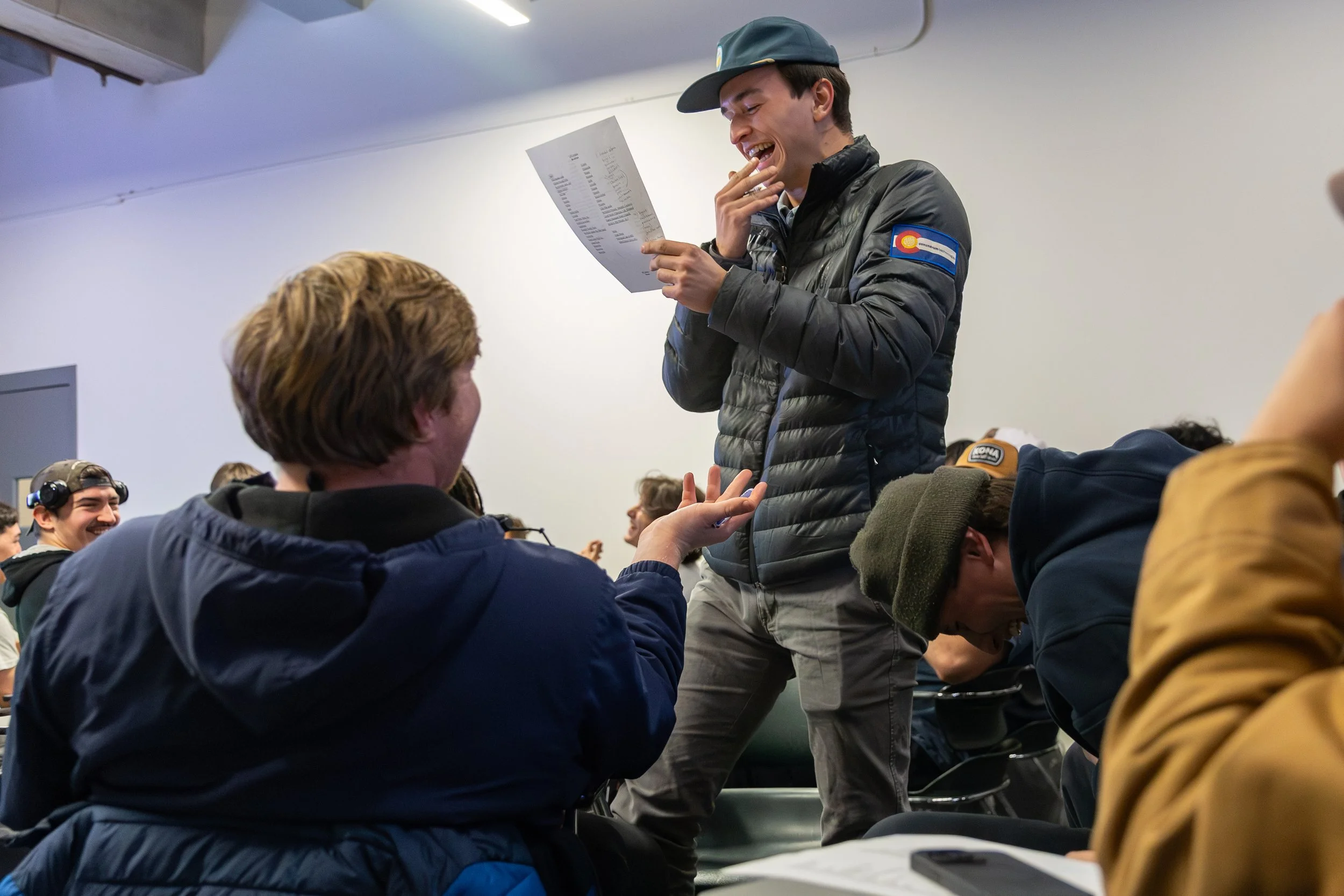 Teammates laugh during a team nutrition session on Nov. 17, 2025. Patrick attributes the team's deep bond to the time they spend together in training, community events, and team-building activities, as well as to the physical sacrifice the sport dema