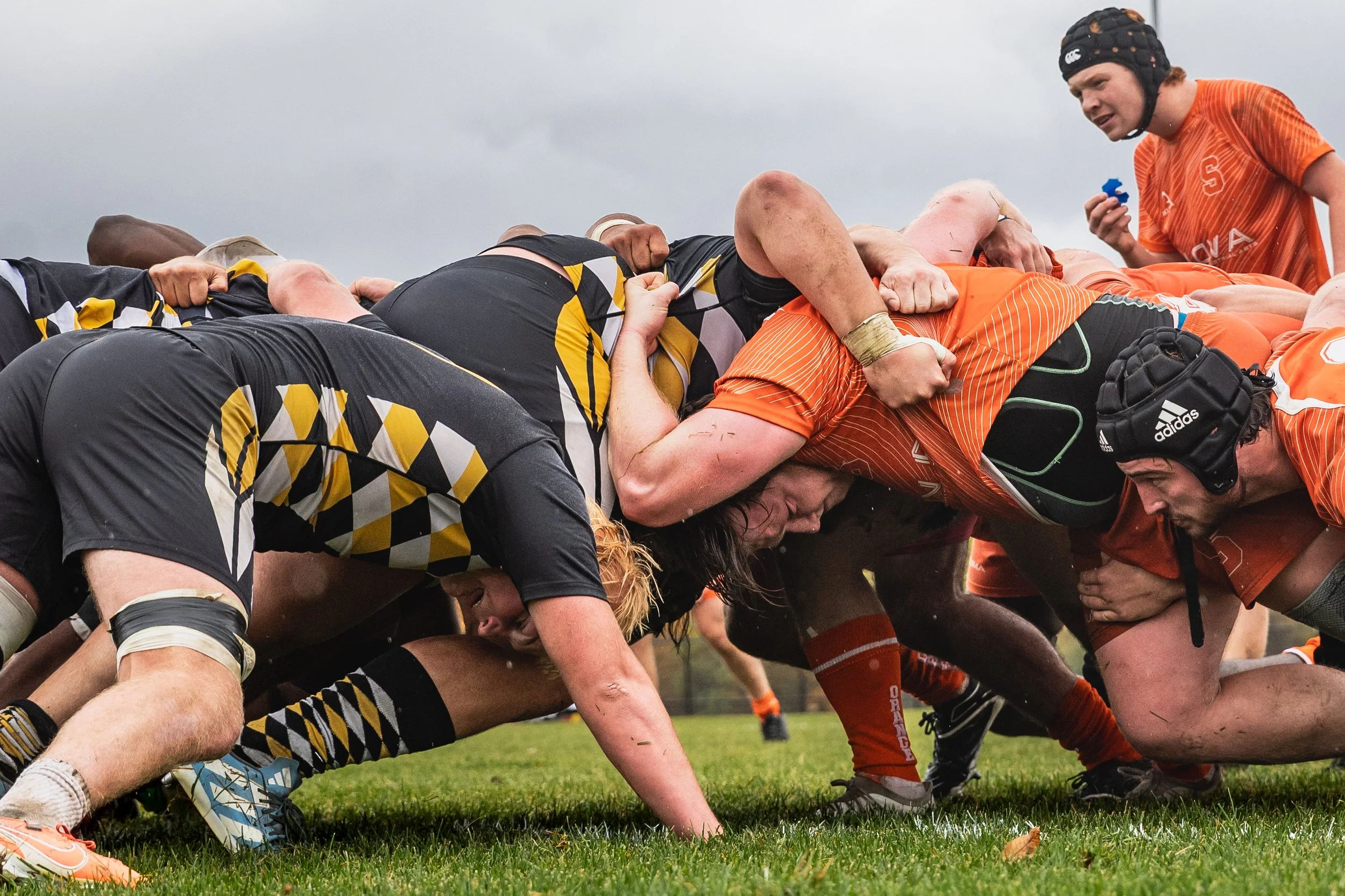 During a match against American International College, Patrick prepares for a scrum on Oct. 25, 2026. Rugby’s physical nature creates deeper bonds between Patrick and his teammates, who put their bodies on the line for each other every day. “I have s