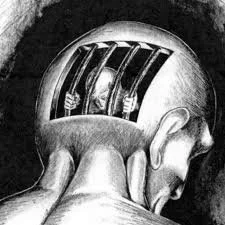 A human head with part of the skull removed, revealing a jail cell with bars inside.