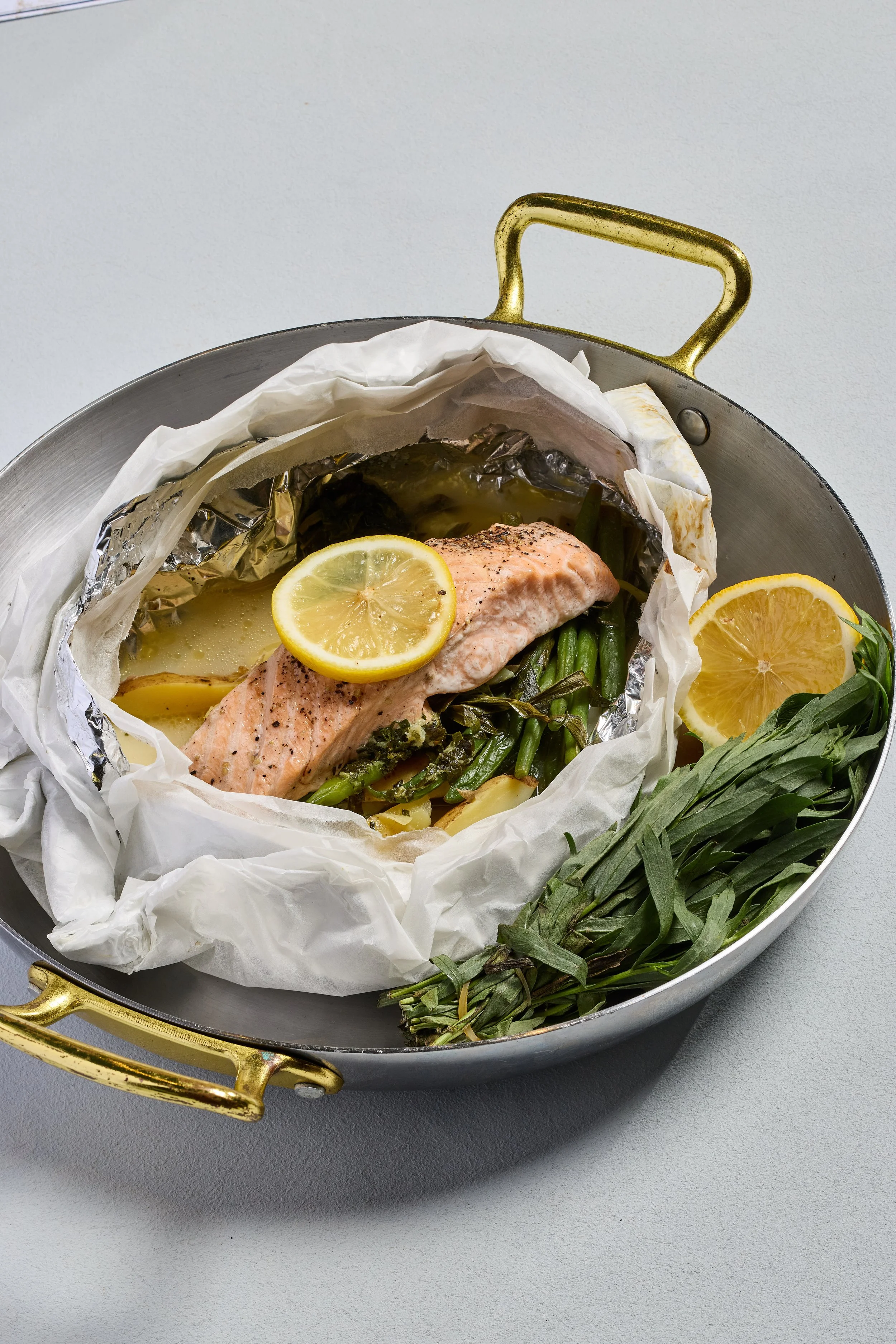 Food Menu À Poêle New A La Carte - Salmon en papillote, potatoes, tarragon, lemon, garlic butter 1.jpg