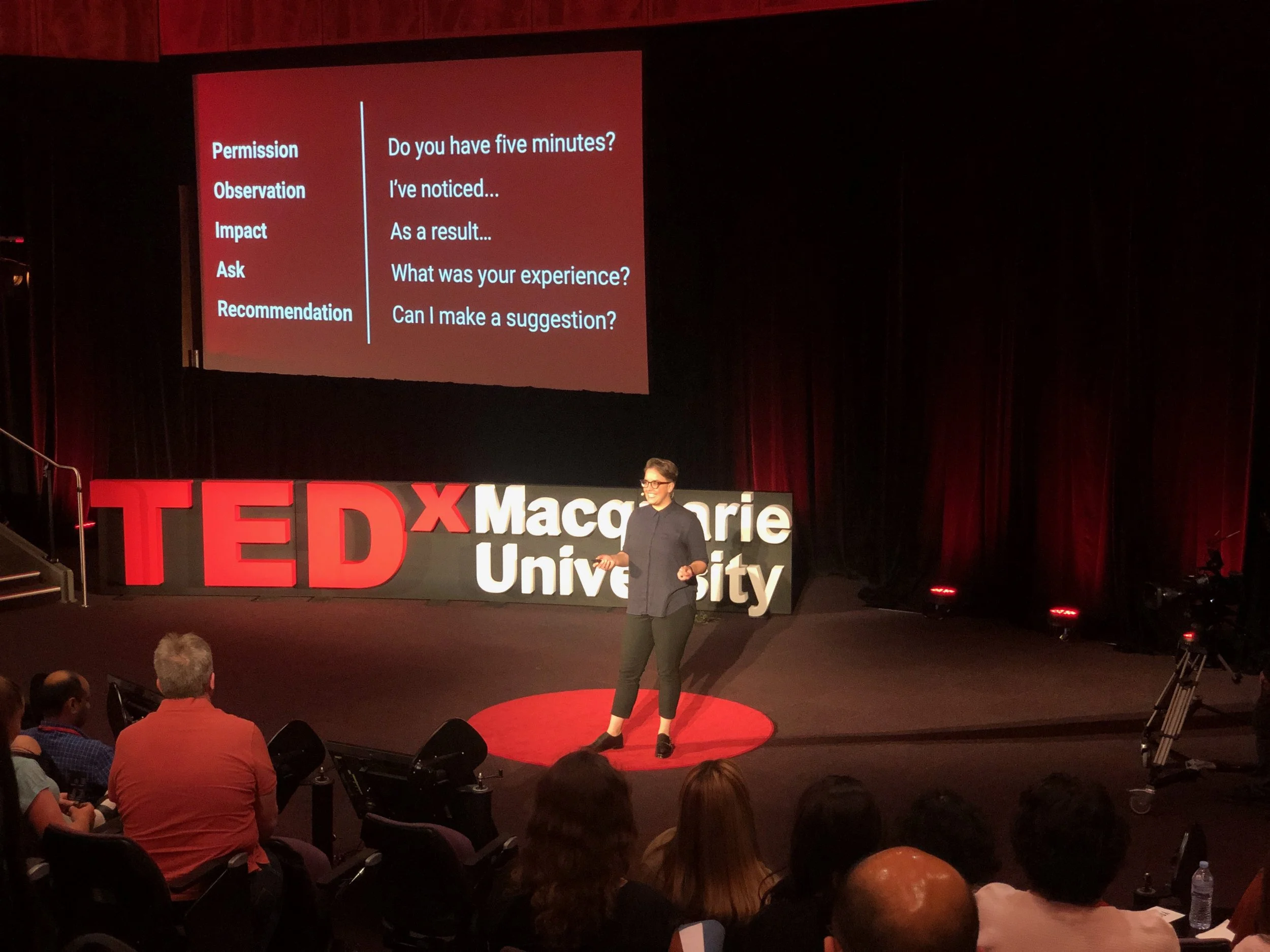 Career Coach Sadie Said standing on stage at Tedx Macquarie University in 2019