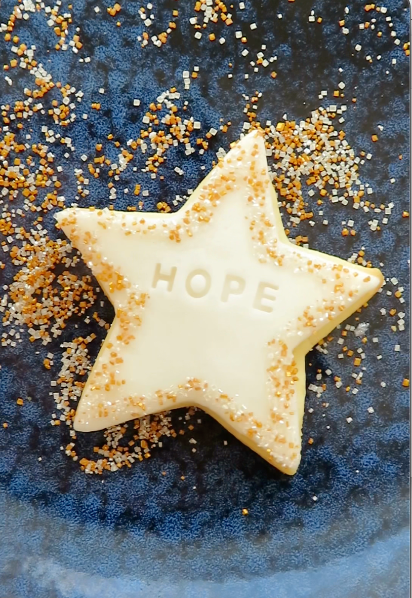Fondant Iced Star Sugar Cookie with the word hope stamped into it