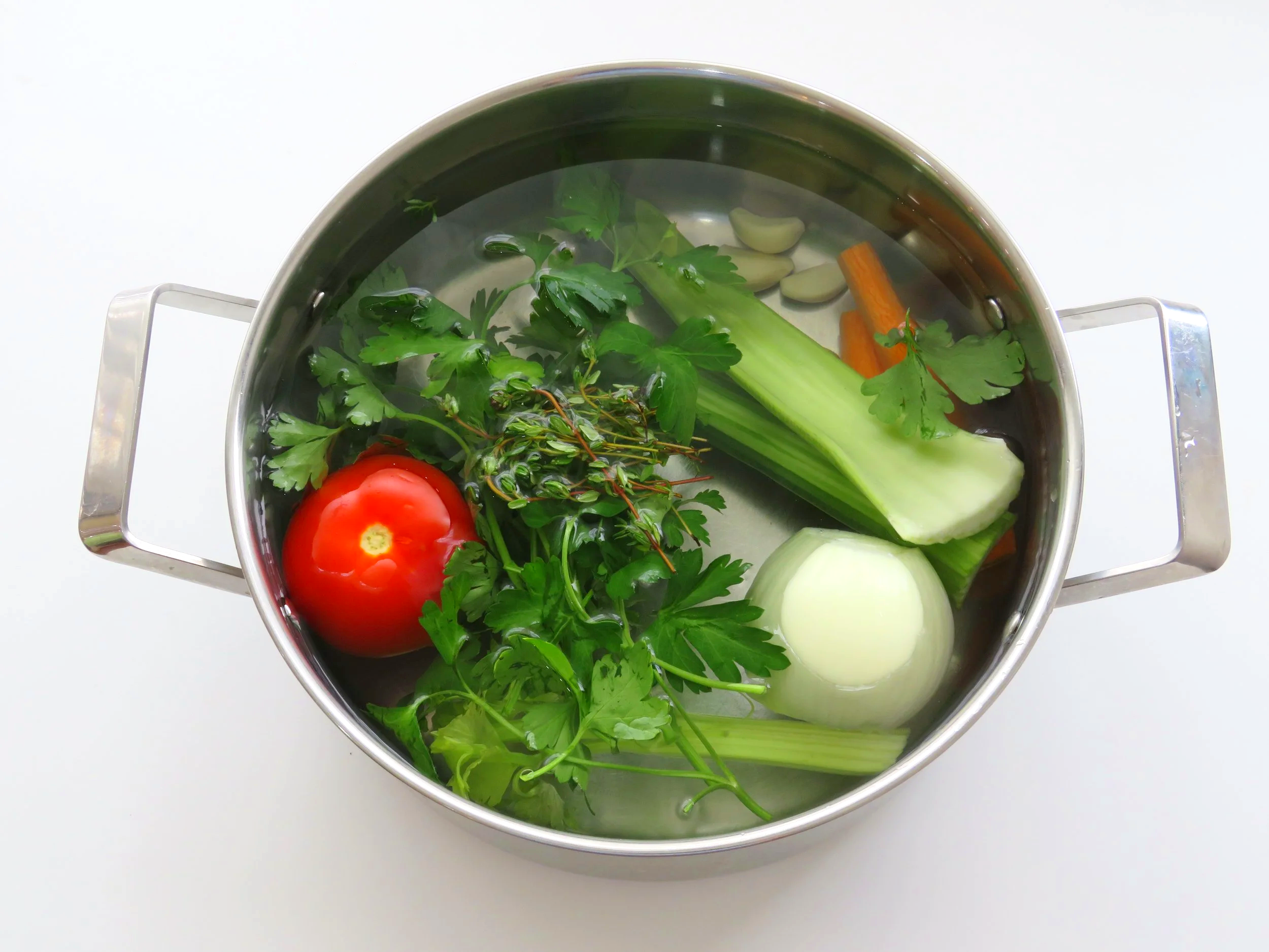 Ingredients for vegetable stock in pot