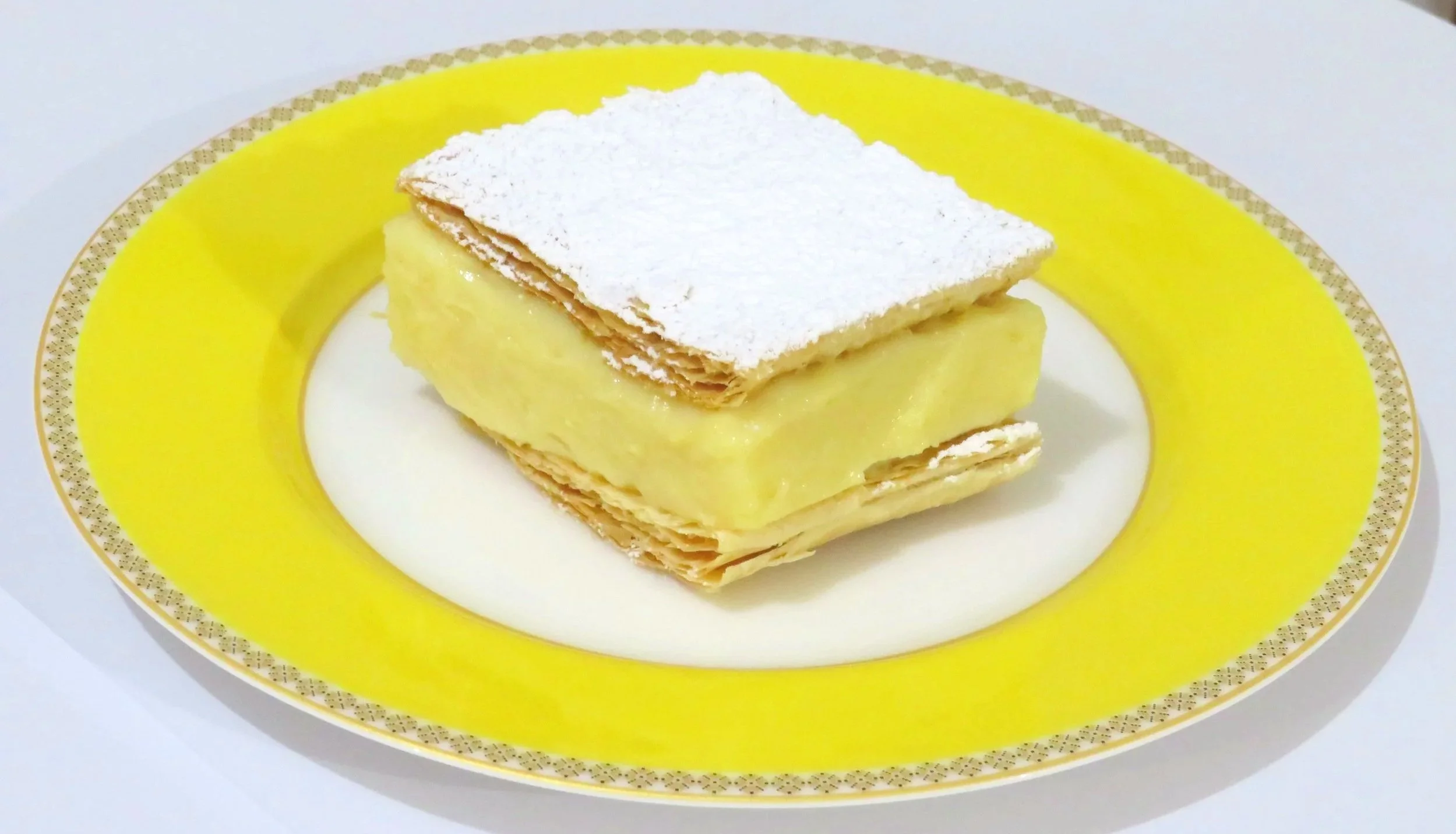 Vanilla Slice on Yellow Rim Plate