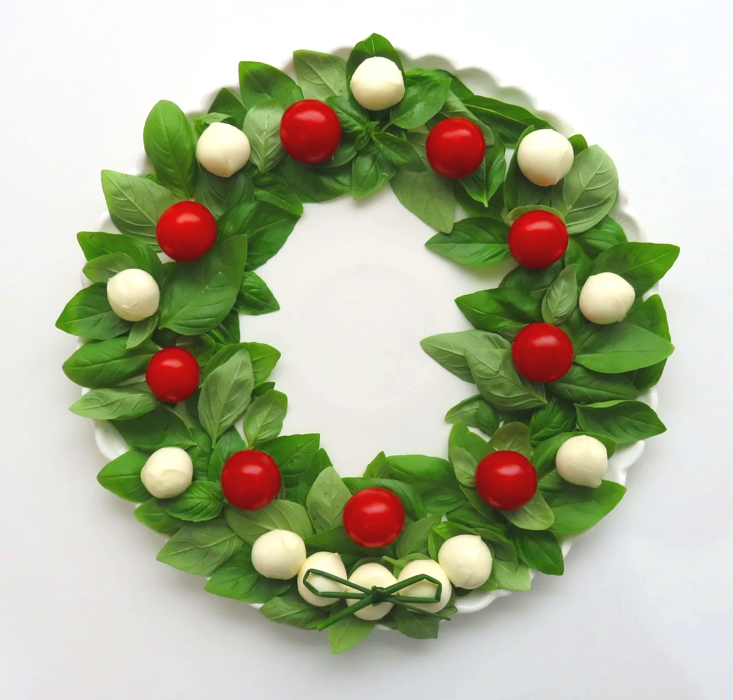 Caprese Salad arranged as an edible Christmas Wreath