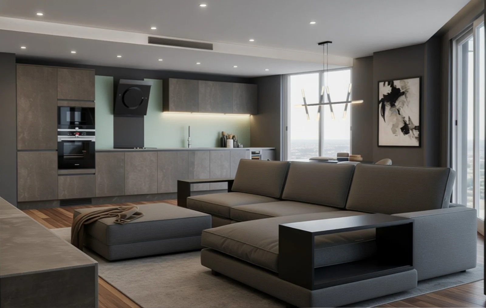 Modern, open-plan kitchen/living room with a light-colored sofa area, abstract wall art and large windows overlooking the outdoors.