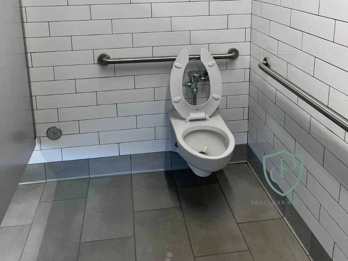 Spotless commercial bathroom stalls after professional post-construction cleaning