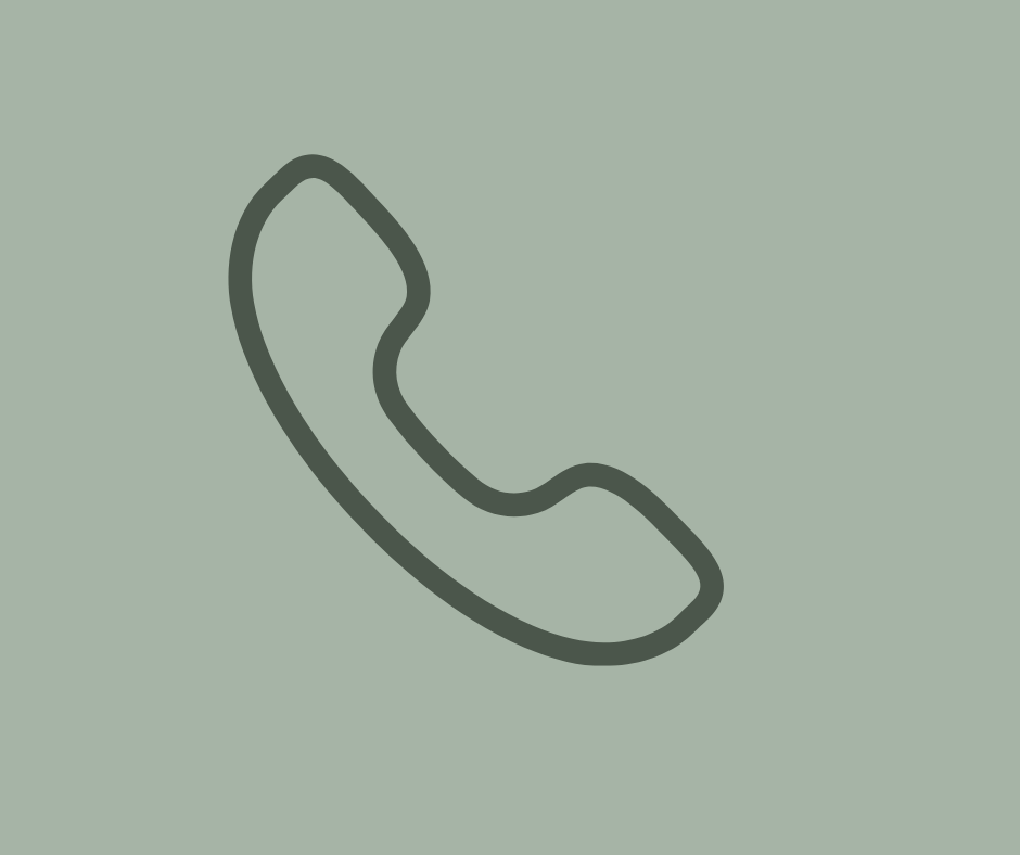 Simple telephone handset icon on light green background.