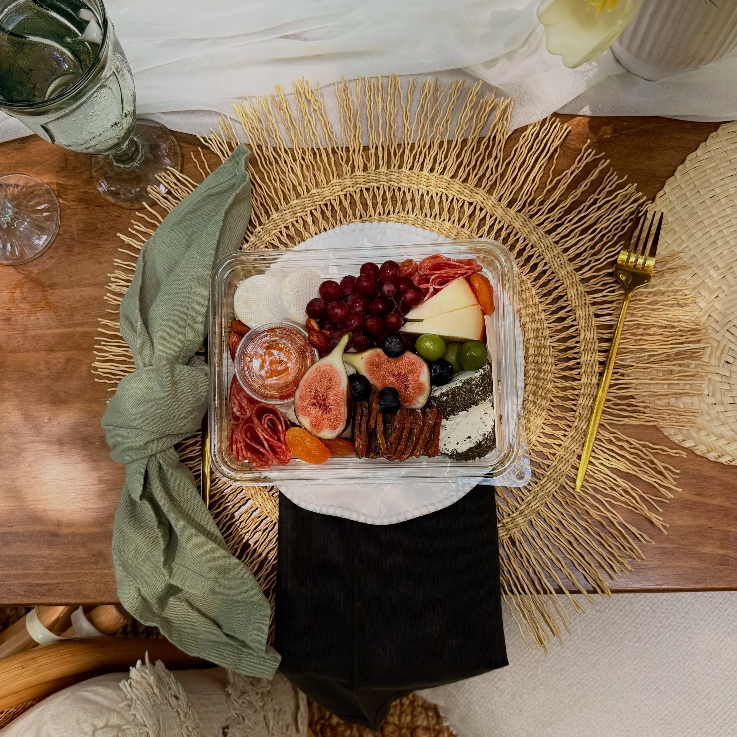 Personal-sized charcuterie boxes for each guest at our all-inclusive luxury picnics in Raleigh, North Carolina