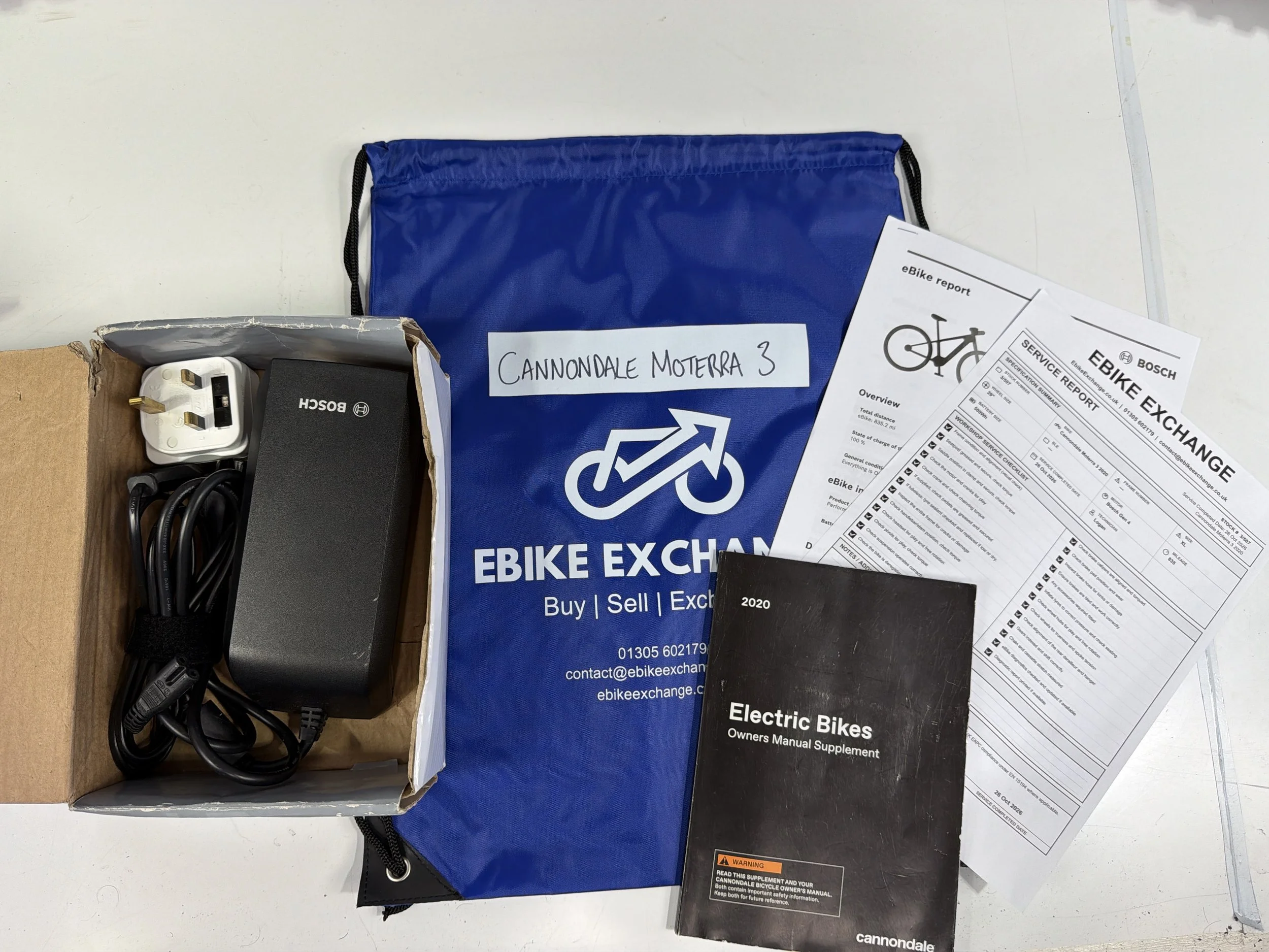 3_507 - 99 Charger Manuals Service Reports Box Contents.jpg