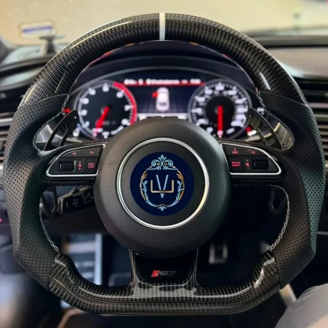 Bespoke carbon fiber steering wheel for an #Audi #RS7.

Finished with Lunar Silver stitching to perfectly match the factory seats, this custom build elevates both feel and finish while maintaining OEM-level fit and integration.

Every Ultravantage wh