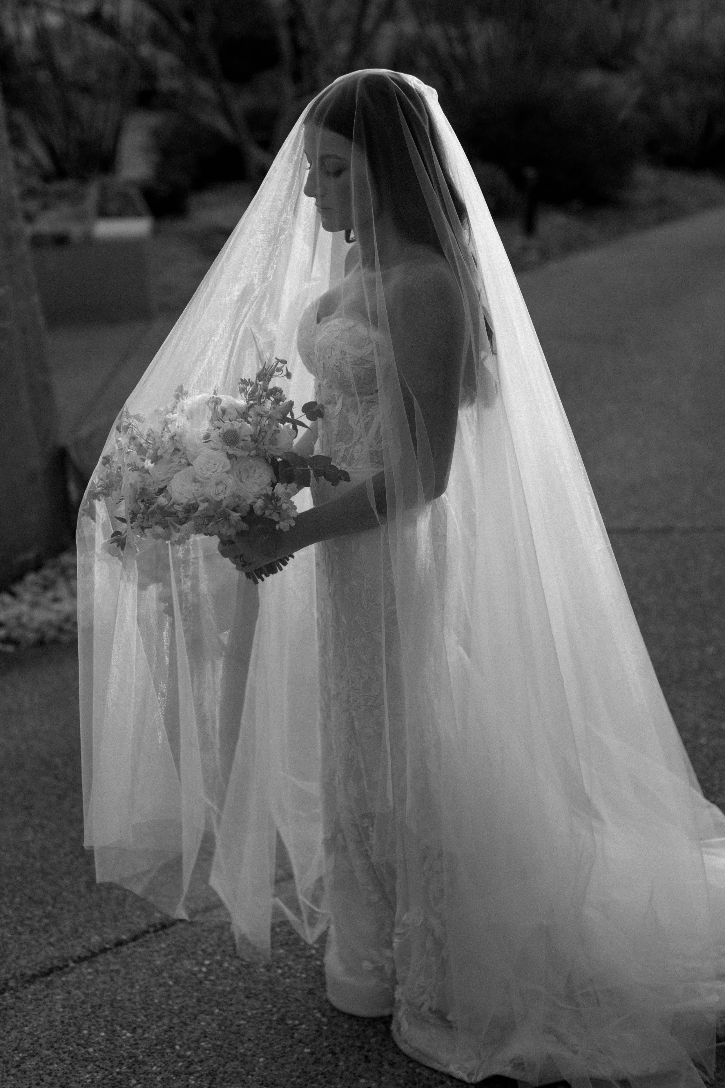 Editorial bridal portrait - having a moment with the veil.