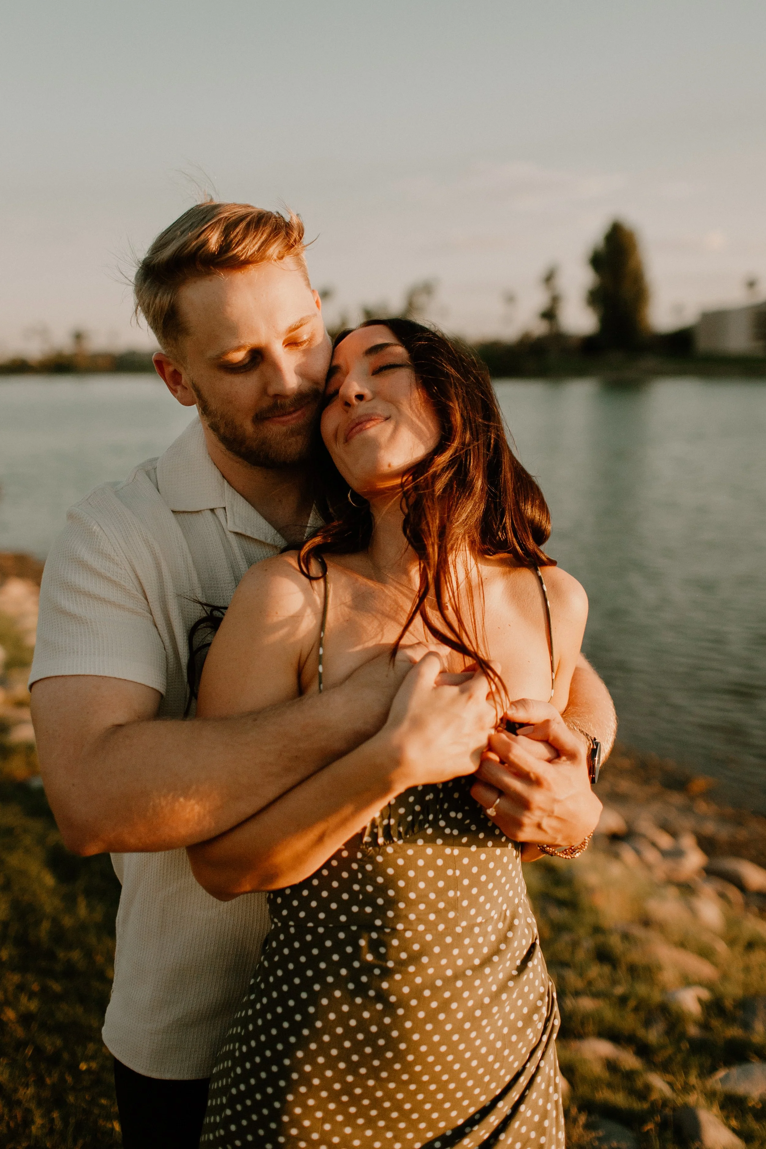 An intimate embrace, lakeside in Scottsdale, Arizona - capturing the beauty of natural light during a golden hour.