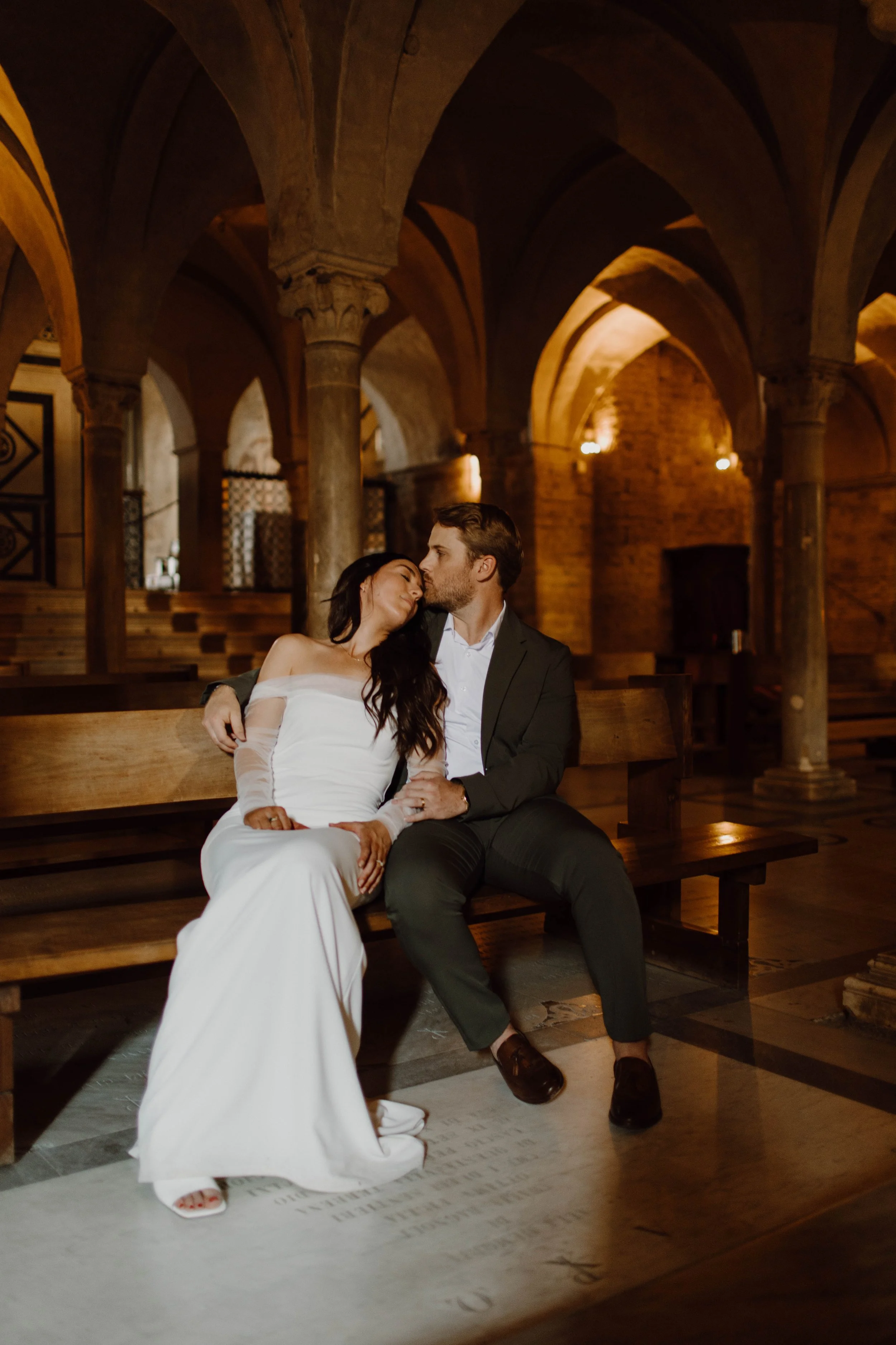 An editorial couple's portrait set in an Italian church in Florence, Italy - timeless wedding photography, poetic and nostalgic.