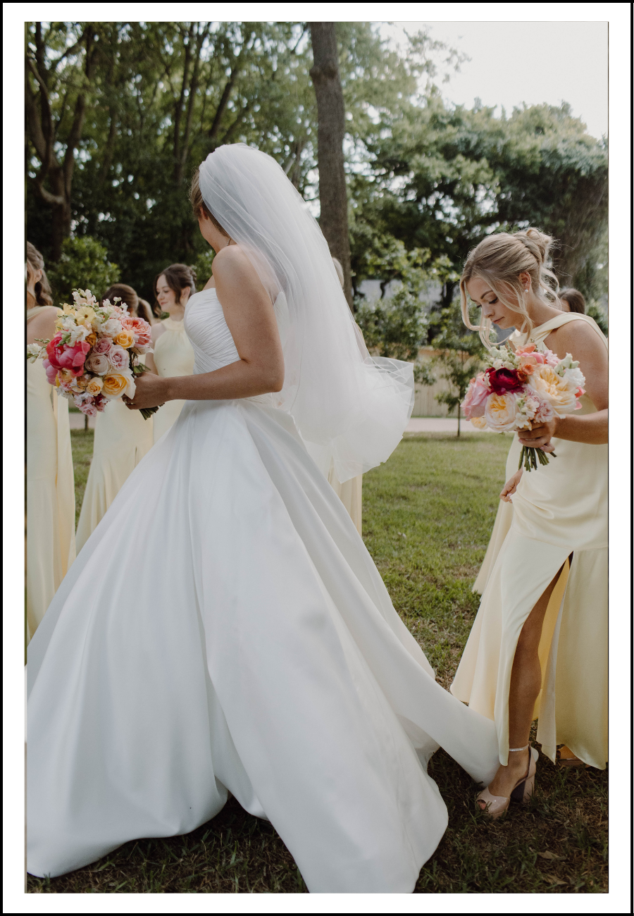A bridal in-between moment with her bridesmaids - honest wedding day storytelling.