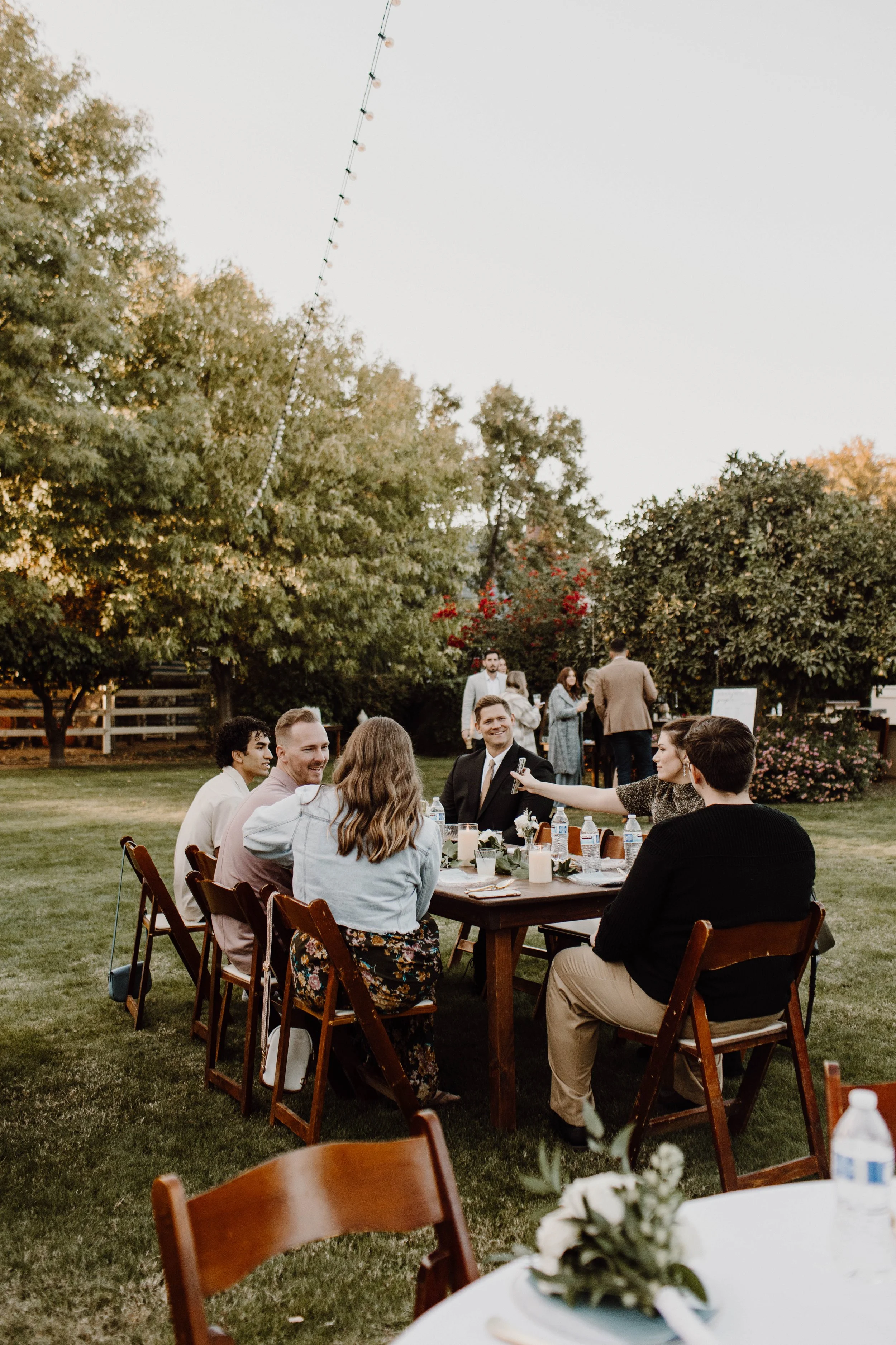 An elevated backyard reception - Mesa, Arizona - captured in a documentary style.