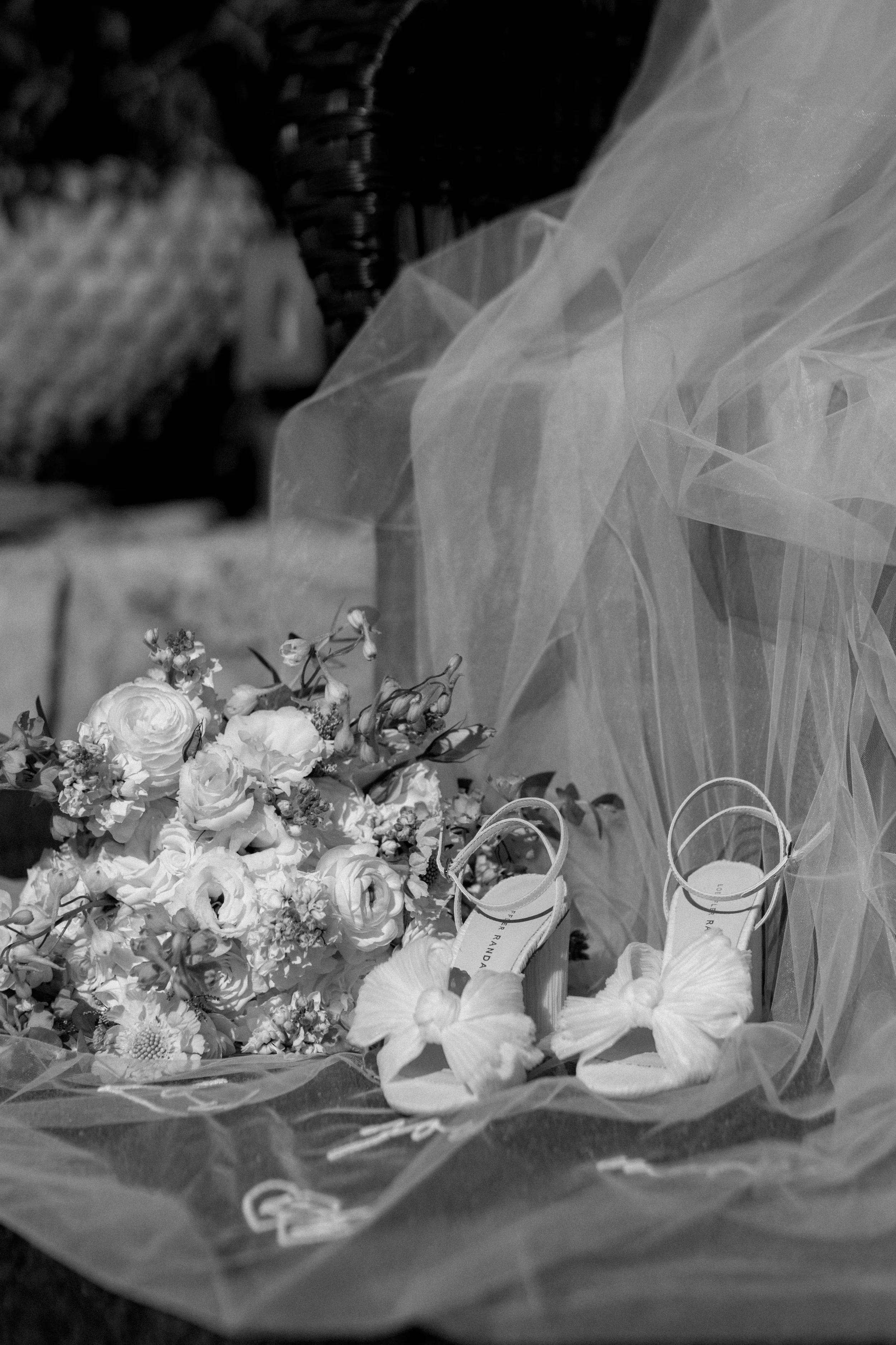 Black and white, editorial bridal details - veil, floral, designer shoes. Details thoughtfully chosen deserve to be thoughtfully documented.
