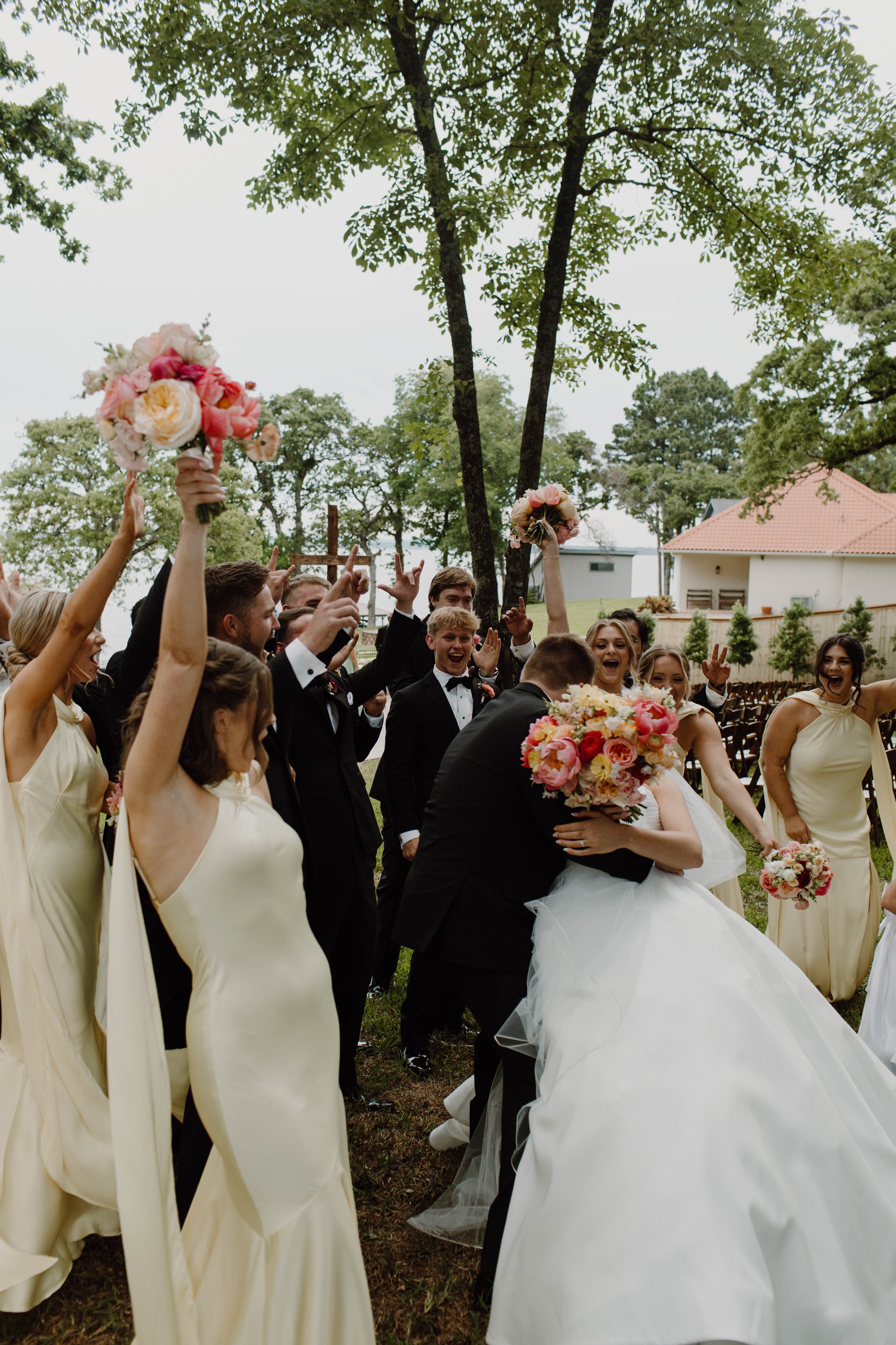 Wedding party celebrating the newly married bride and groom.