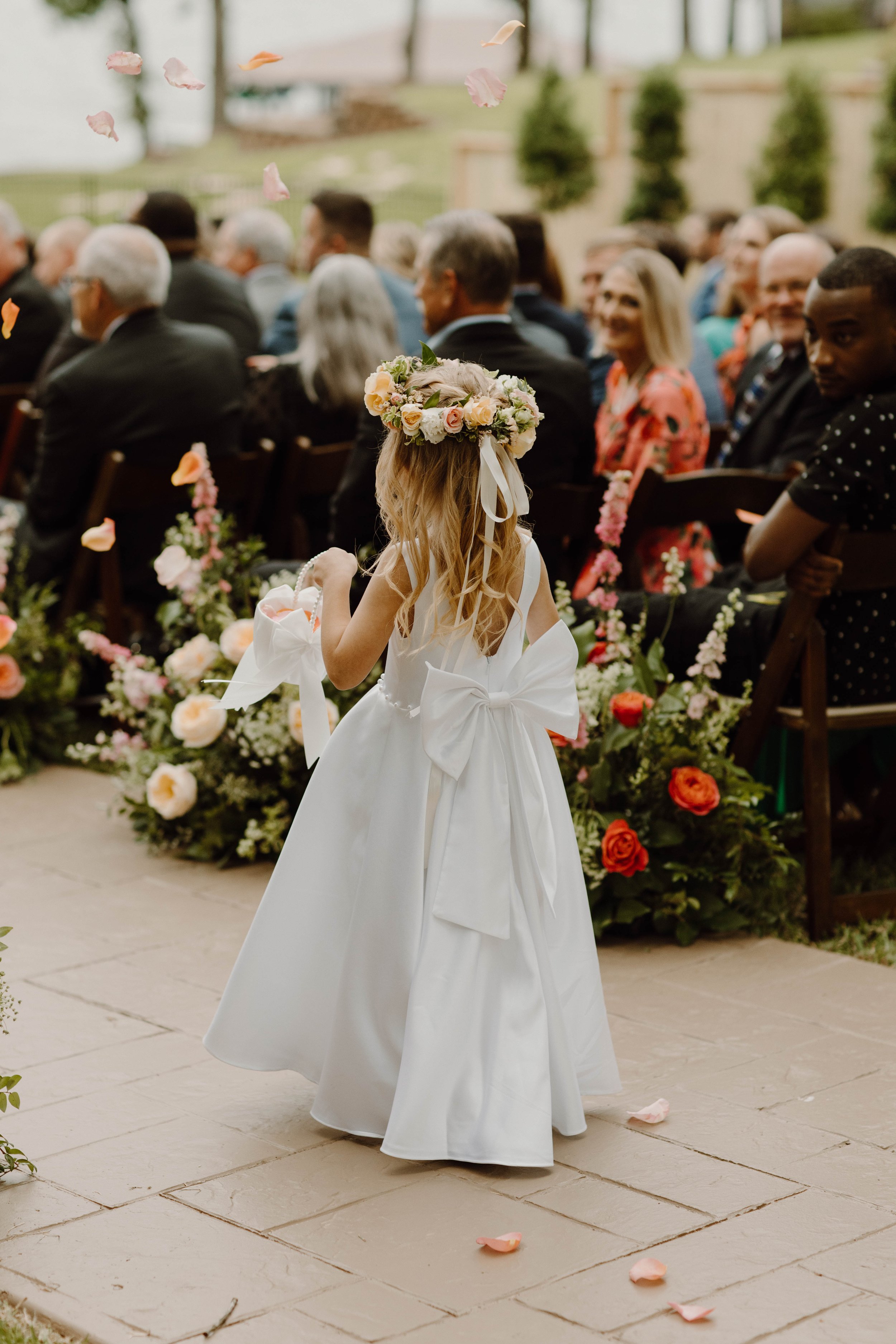 The sweet moment the flower girl walks down the aisle.