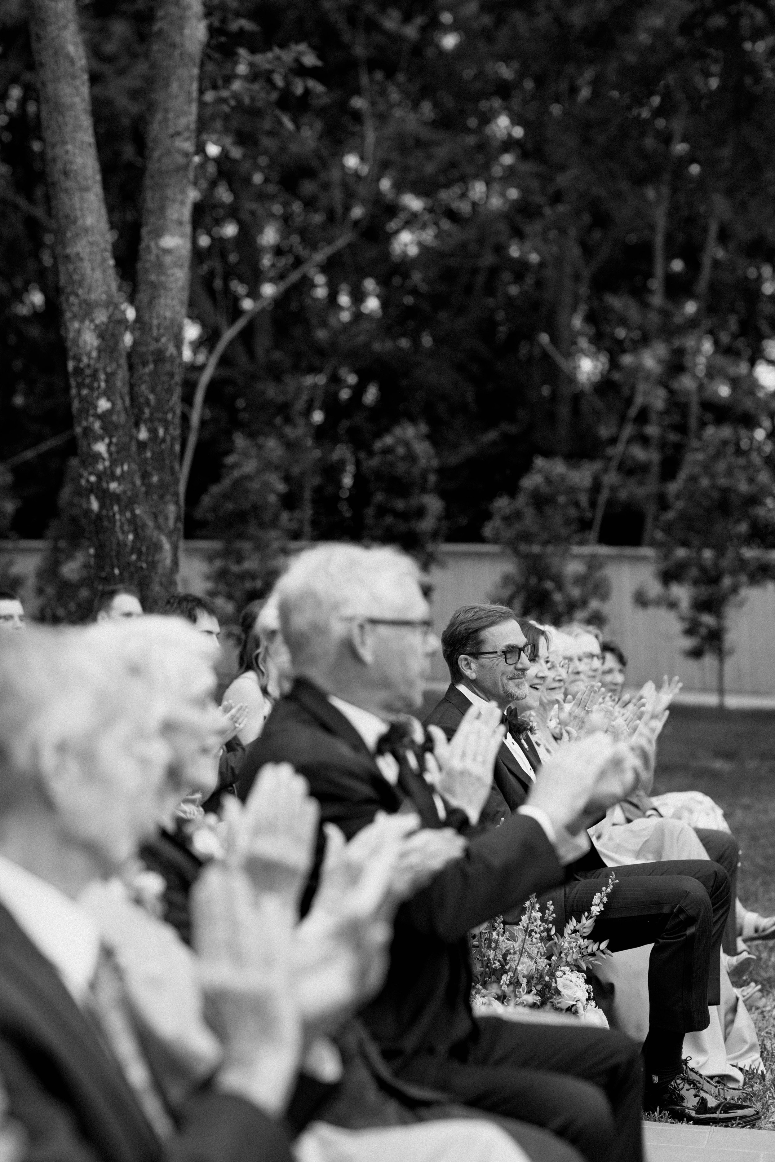 The sweet reaction of family when the bride and groom are pronounced husband and wife - capturing candid reactions to real moments, to round out your gallery.
