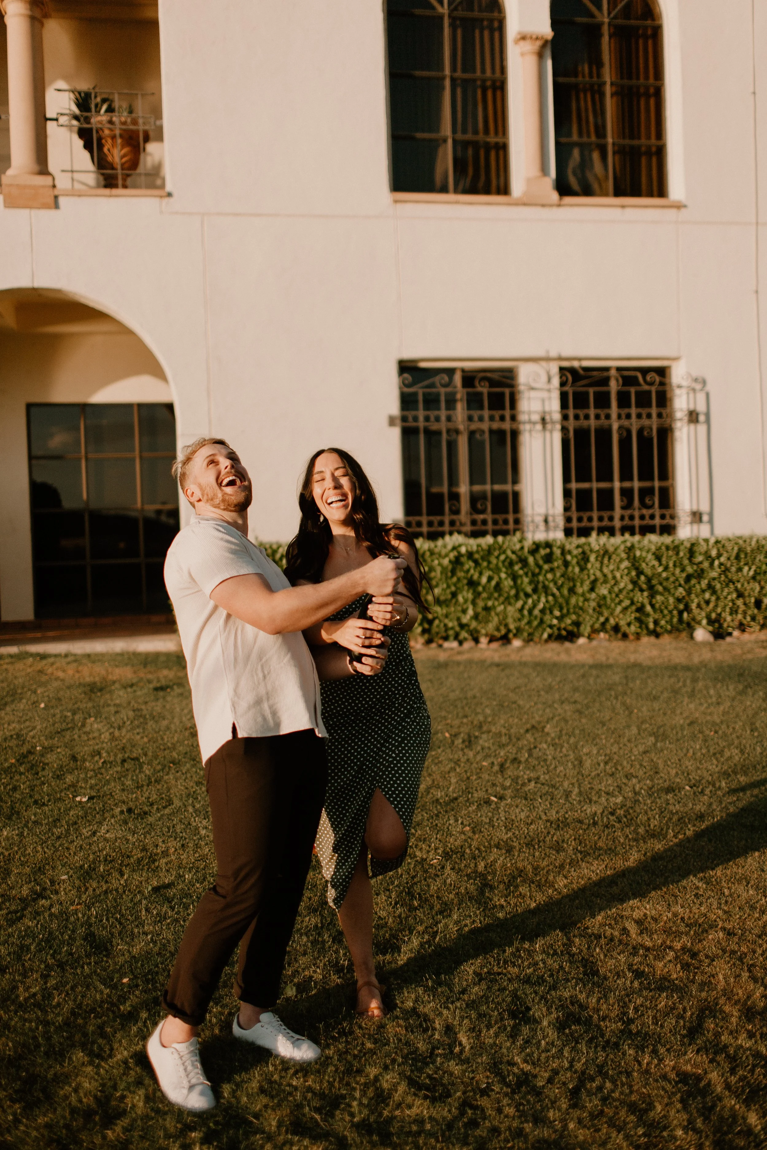 Capturing the little moments as well as the big moments - a newly engaged couple popping champagne after their intimate proposal.  Natural, timeless moments worth reliving.