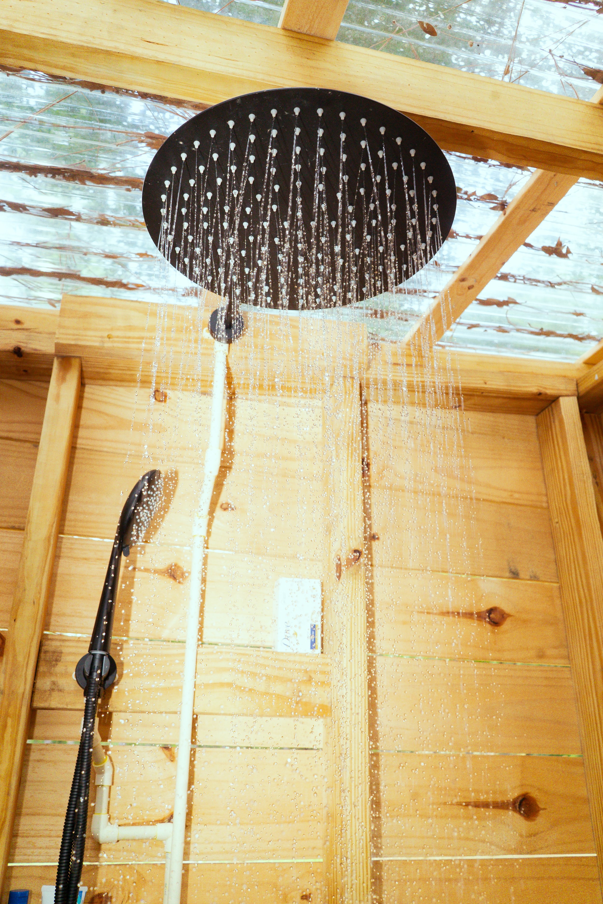 outhouse shower head vertical.jpg