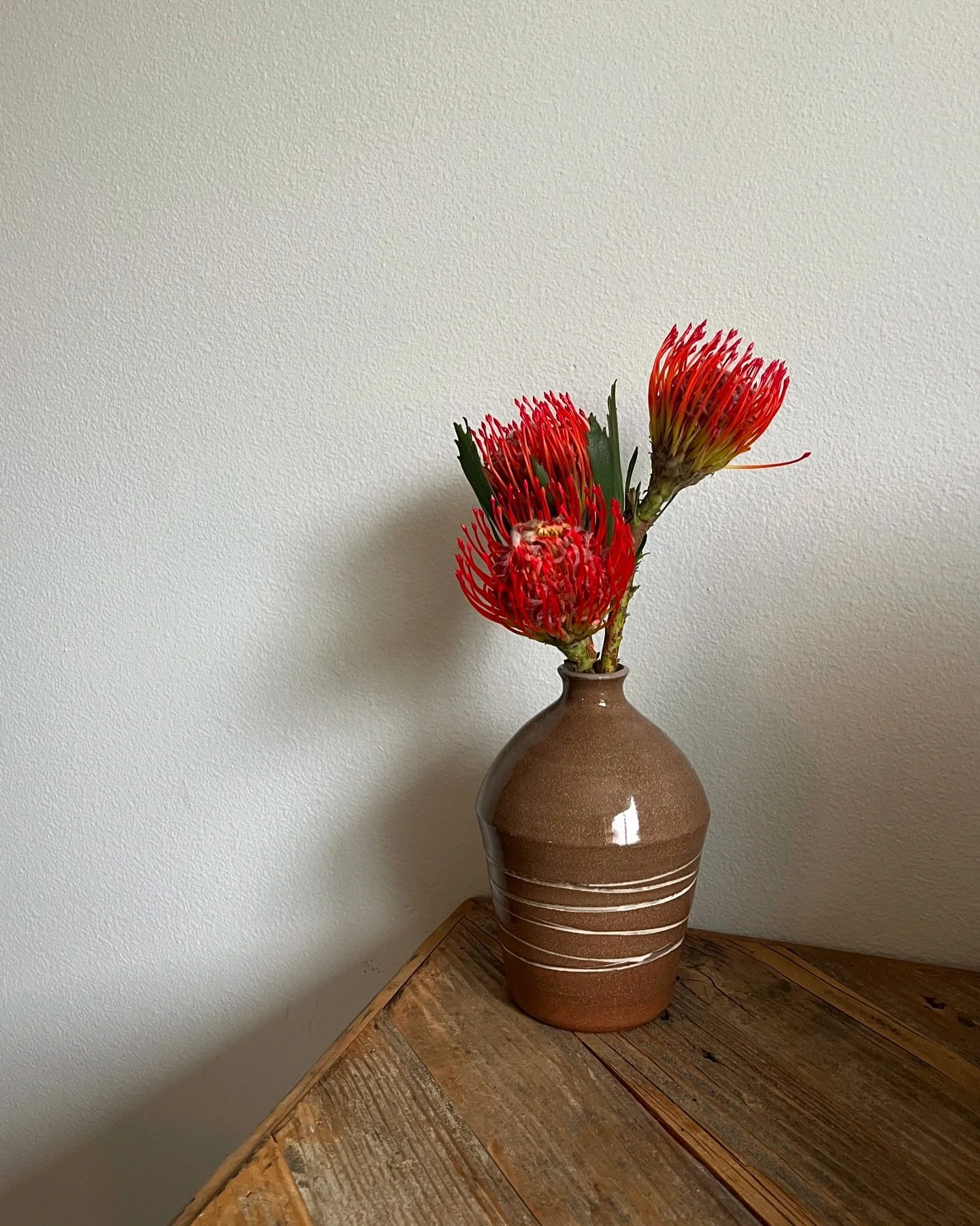 Made this simple vase a while ago and haven&rsquo;t had a chance to share it yet - I cut out and under glazed the white stripes, while the rest of the vase was left with only a clear glaze, showing off the soft shade of brown that naturally occurs in