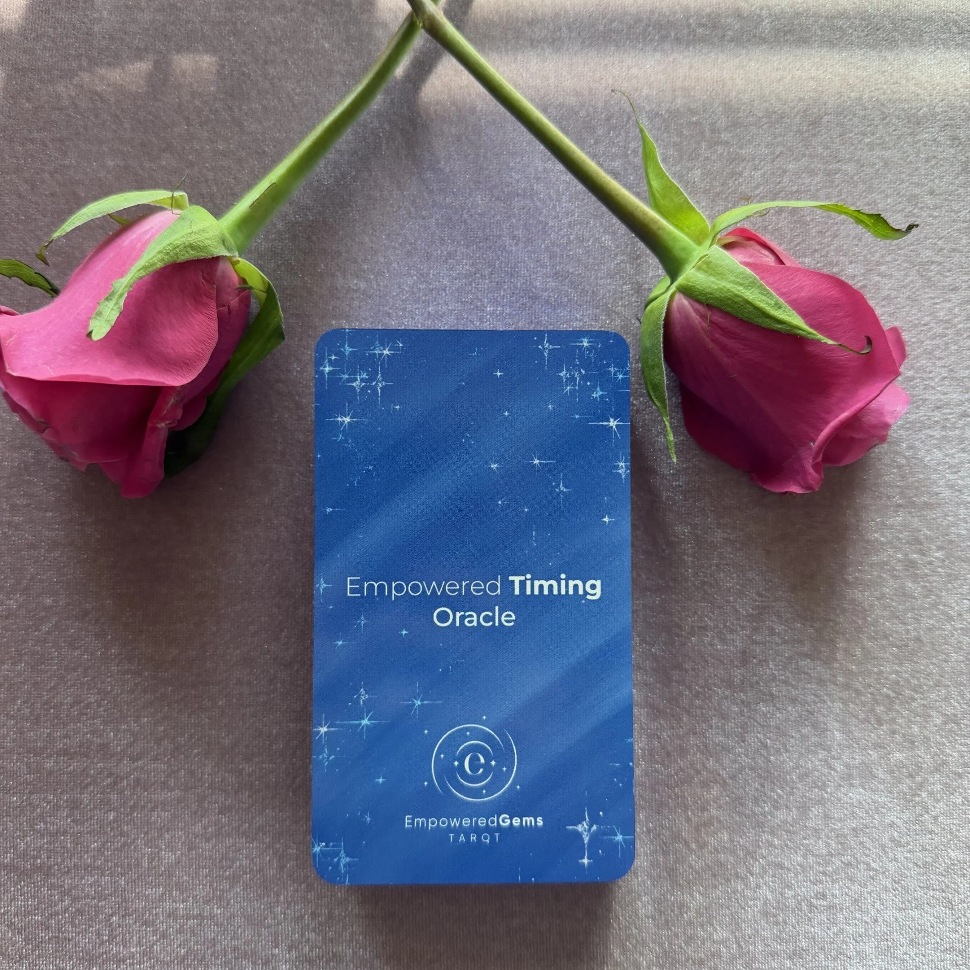 Empowered Timing Oracle deck with pink roses on mauve background.