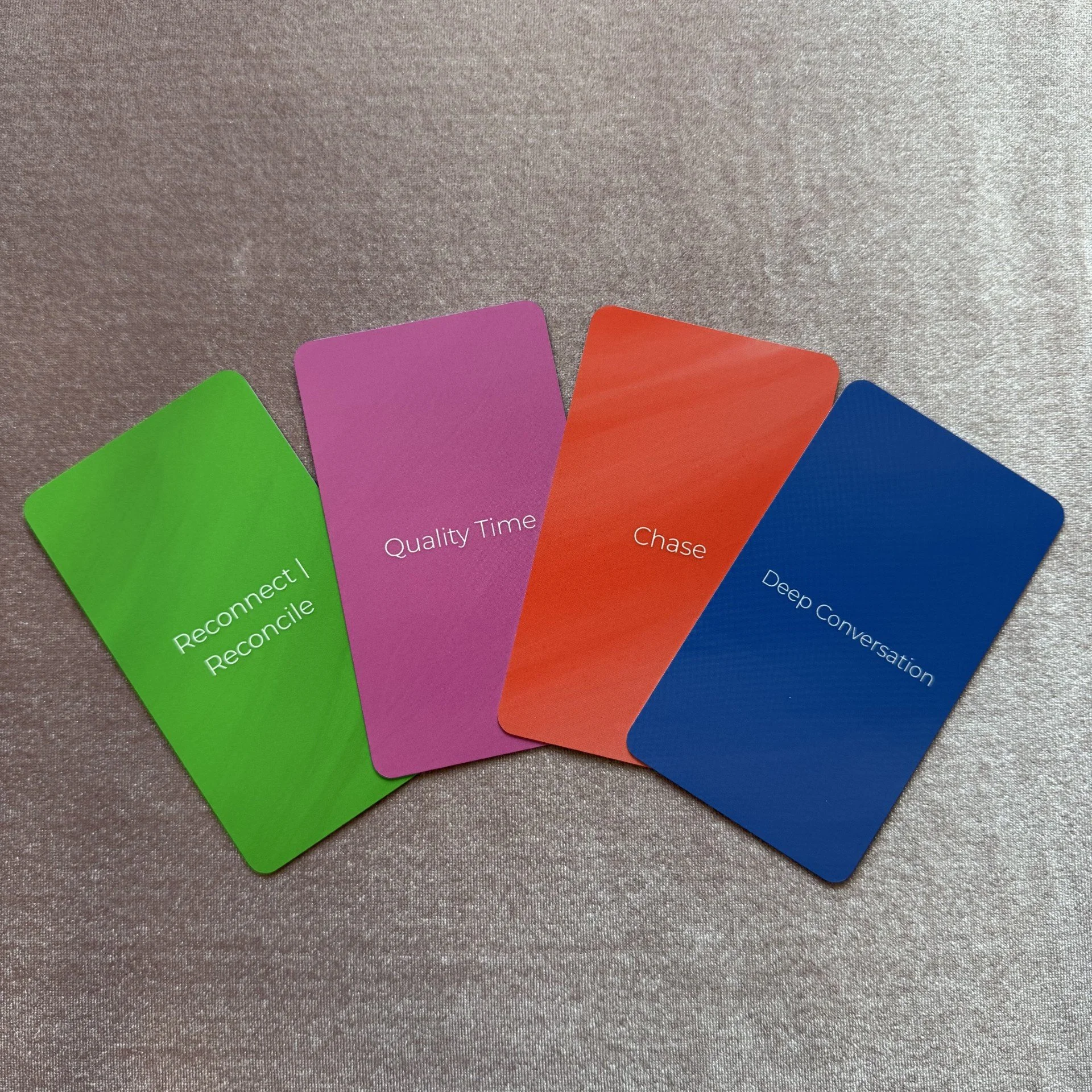 Empowered Action Love Oracle colorful card faces including Quality Time, Chase, and Deep Conversation