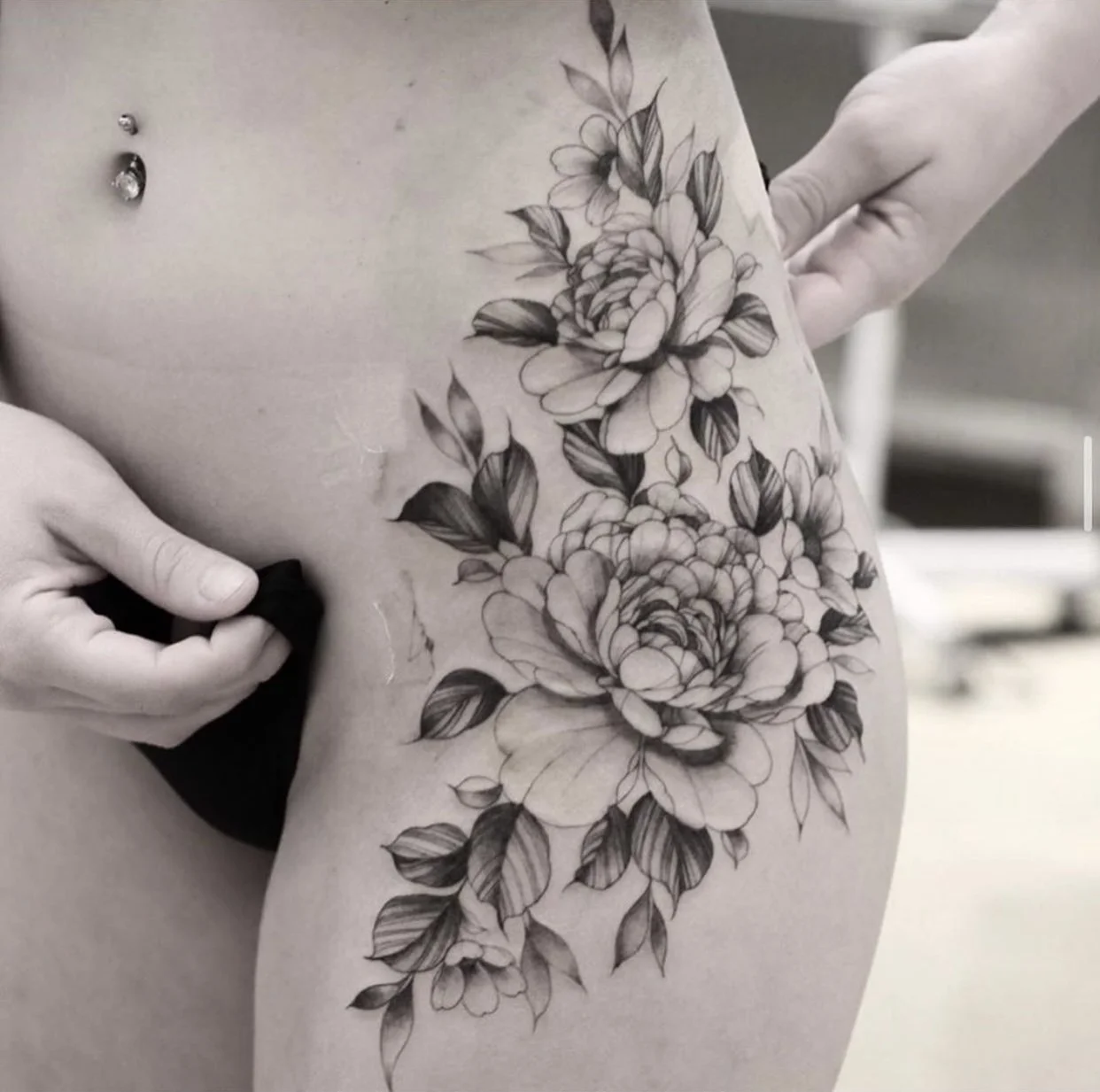 Best bay area fine line floral tattoo on thigh