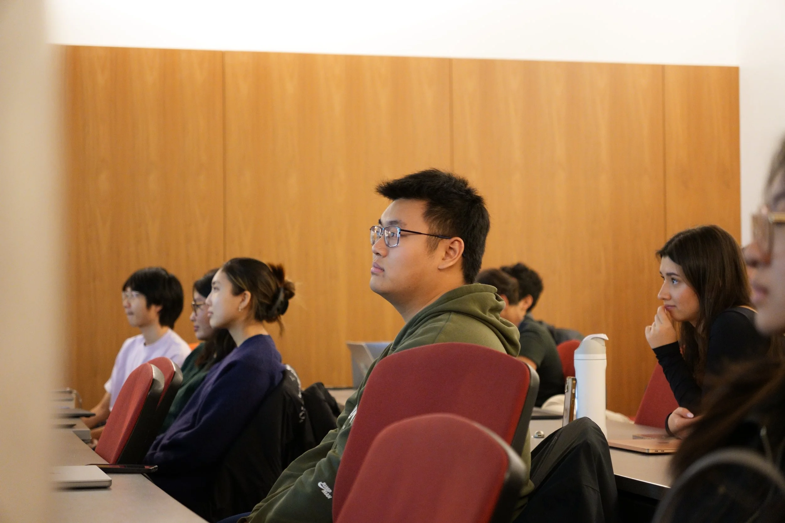 Students listening during Journey into Research