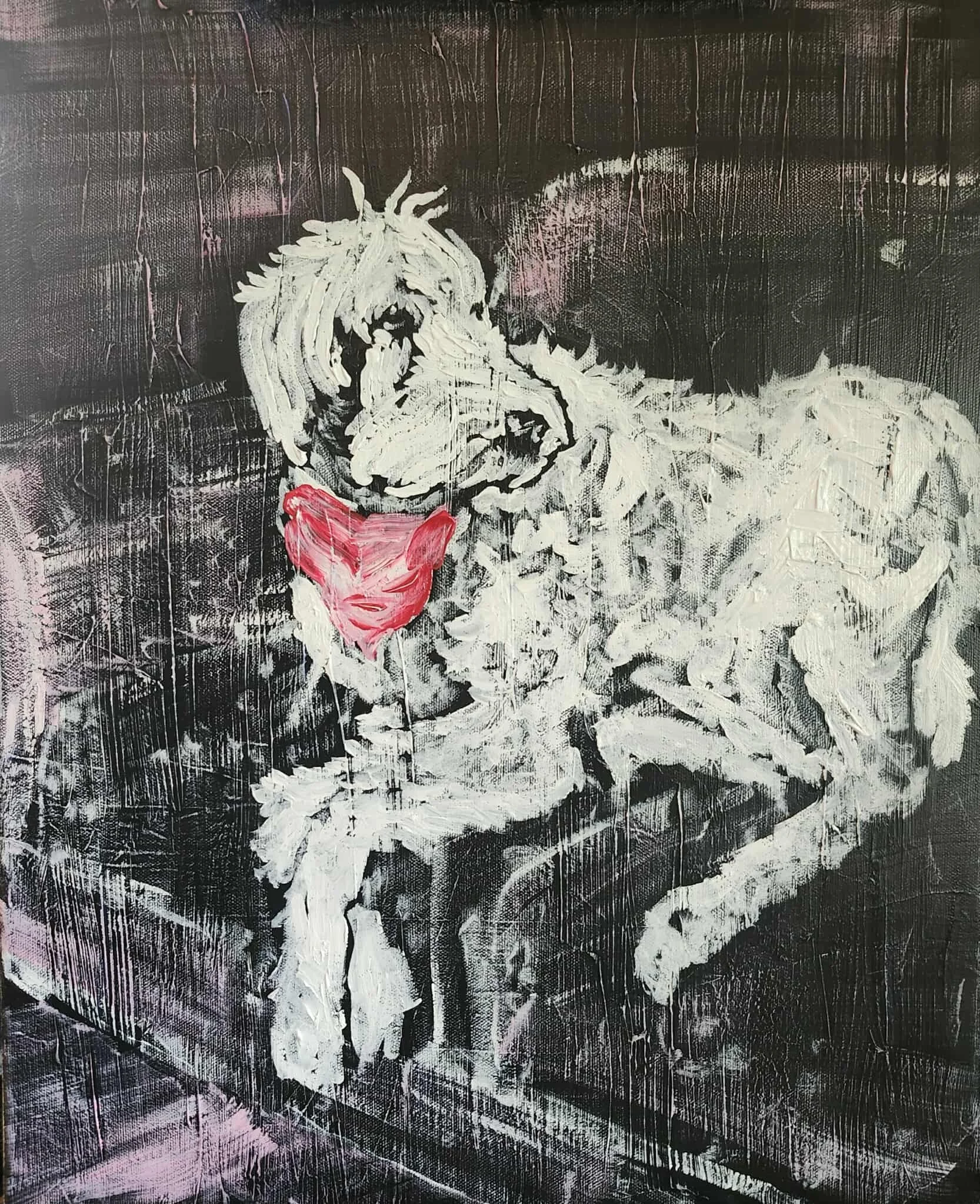 Graffiti art of a dog with a pink tongue on a black wall.