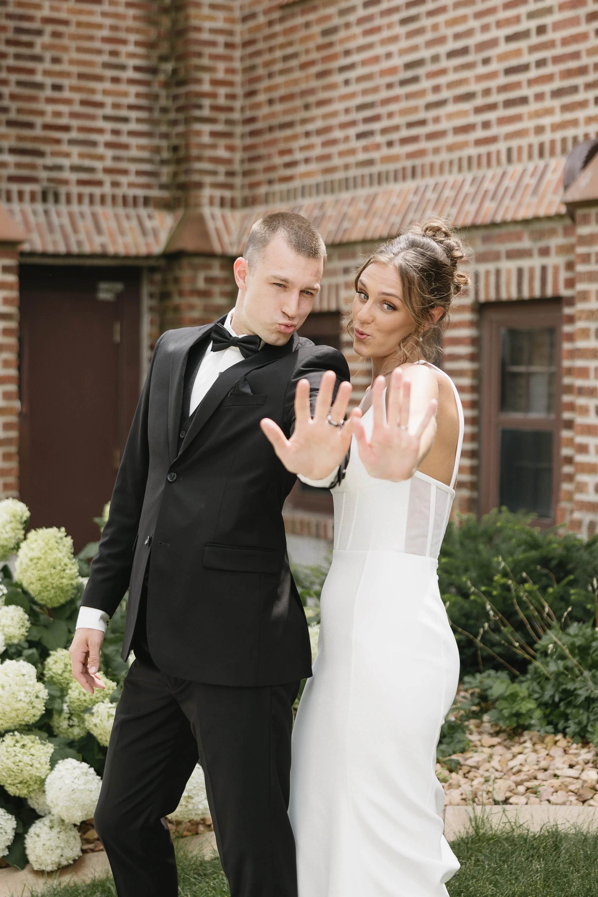 Geometric drawing of an outline square with sections divided by vertical, horizontal, and circle lines.