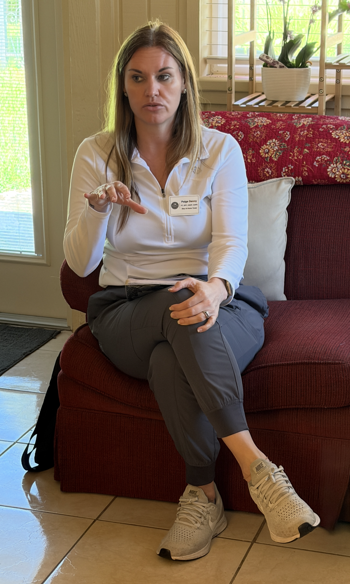 Doctor of Physical Therapy discussing mobility and home needs during an in-home consultation in Houston 3	home-mobility-planning-consultation-houston.jpg