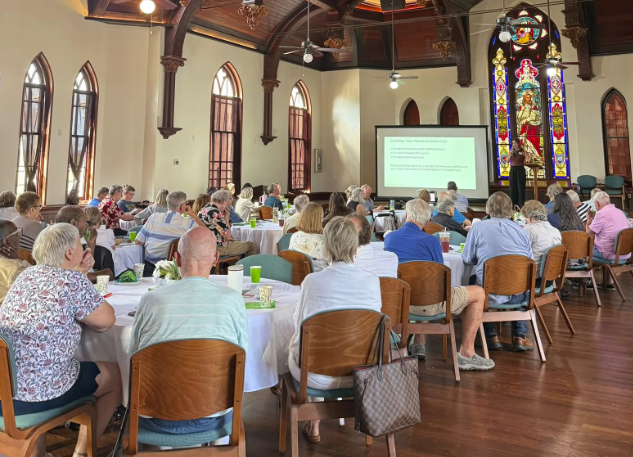 Paige Denny presenting a community education program on home mobility, accessibility, and aging in place to an audience in Houston.