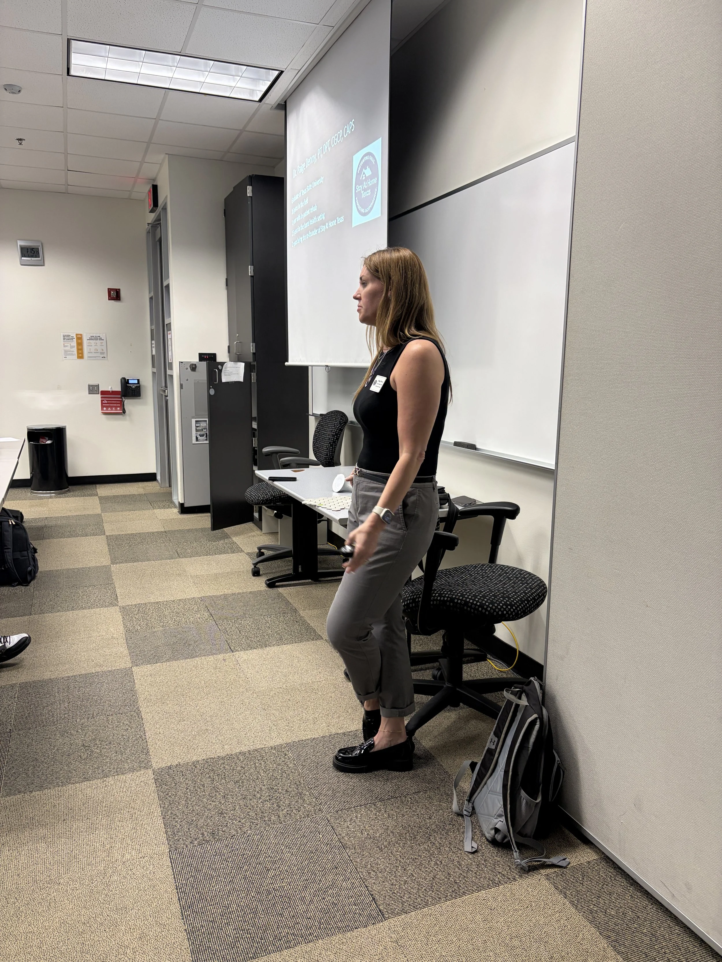 Paige Denny giving a community presentation at Houston Community College about mobility, accessibility, and safer living at home.