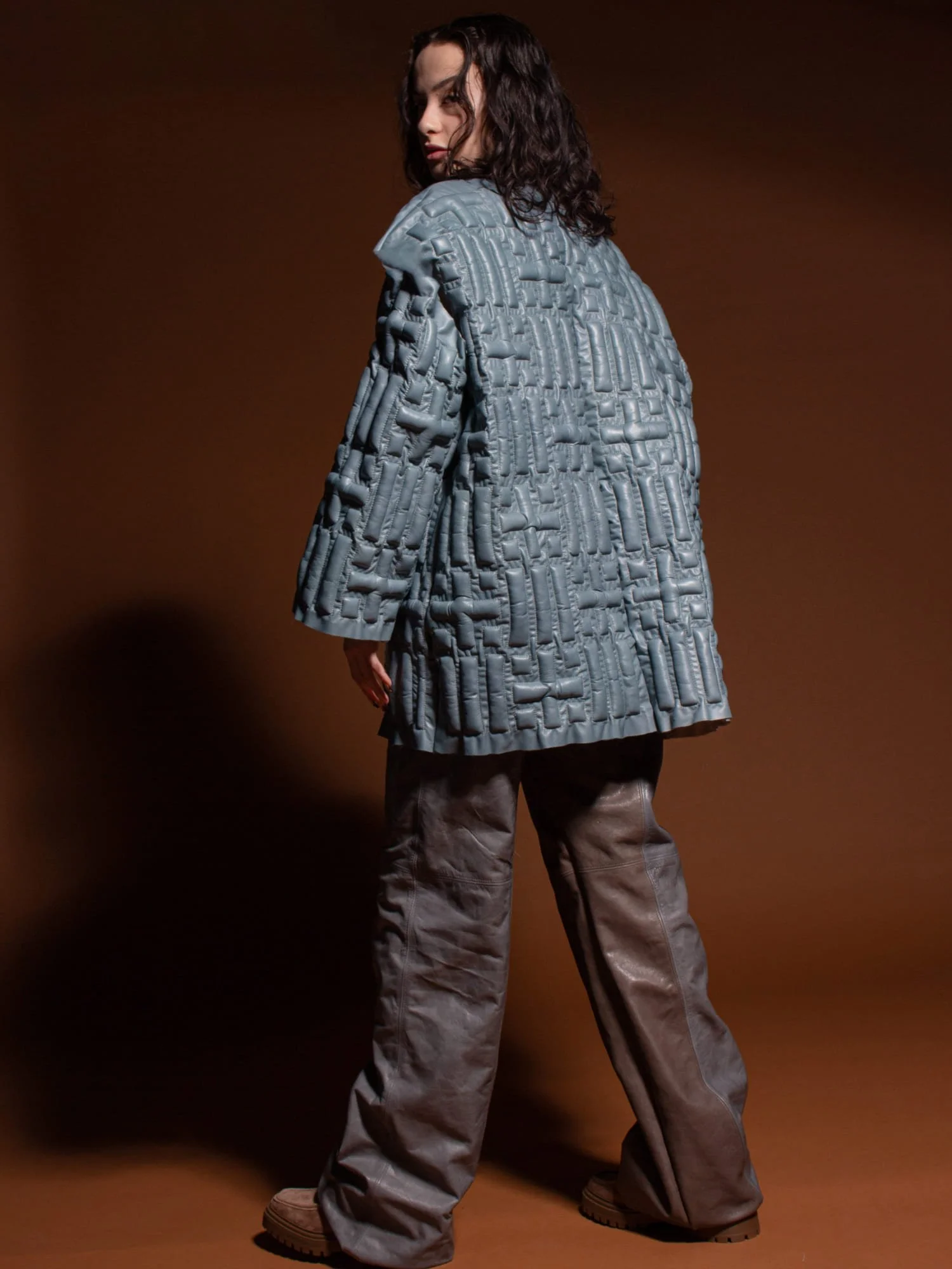 ANADELRIO-Aglaya-Moulded-Blue-Oversized-Leather-Jacket-Grey-Jumpsuit-Trousers.jpg